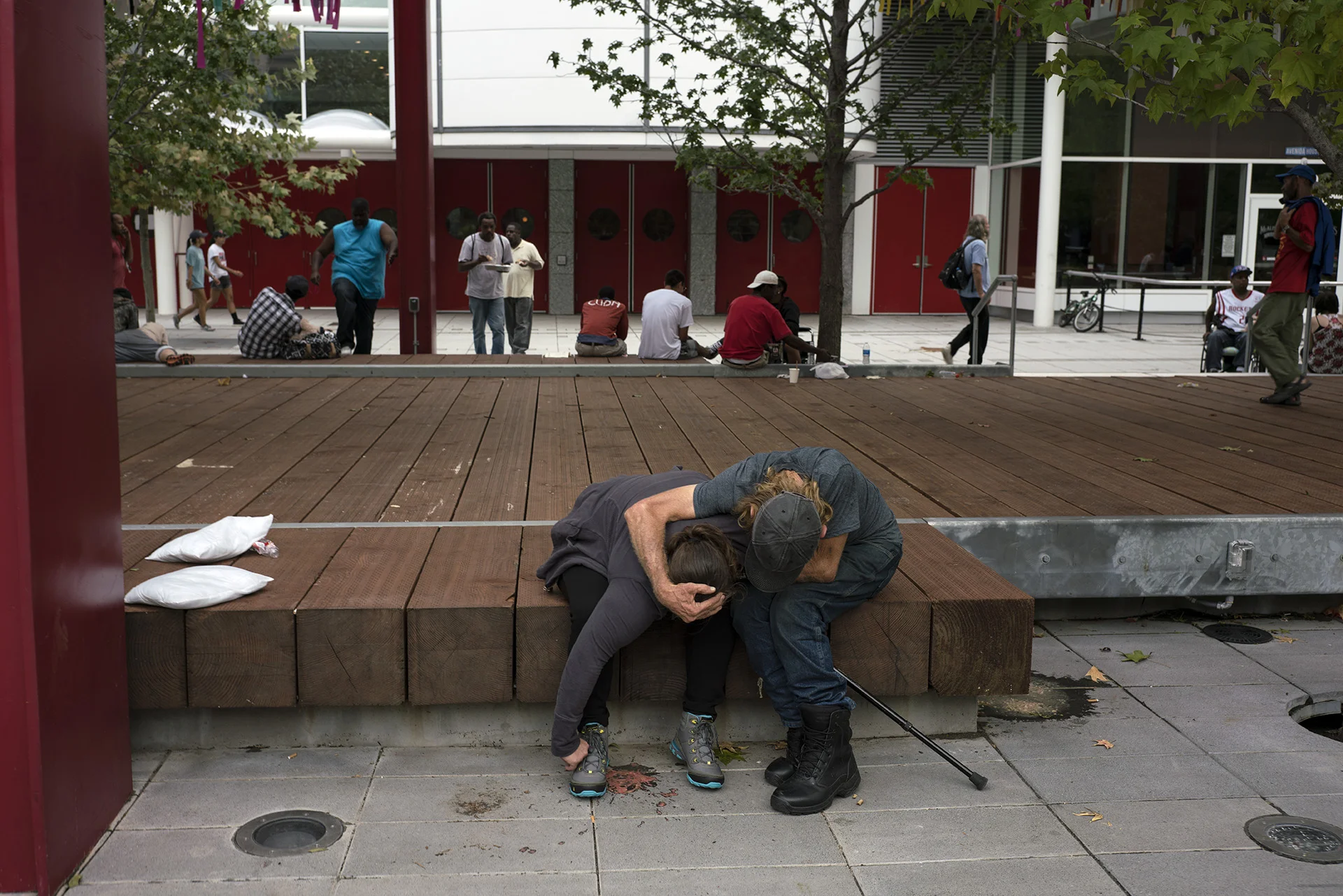 Evacuees outside of the convention center. Many addicts were outside the center coming down off of their addictions and had vomited on the sidewalks. When a disaster such as Harvey happens the underlying needs of society are laid bare and take an additional toll on how to respond to the many requirements that people have to survive.
