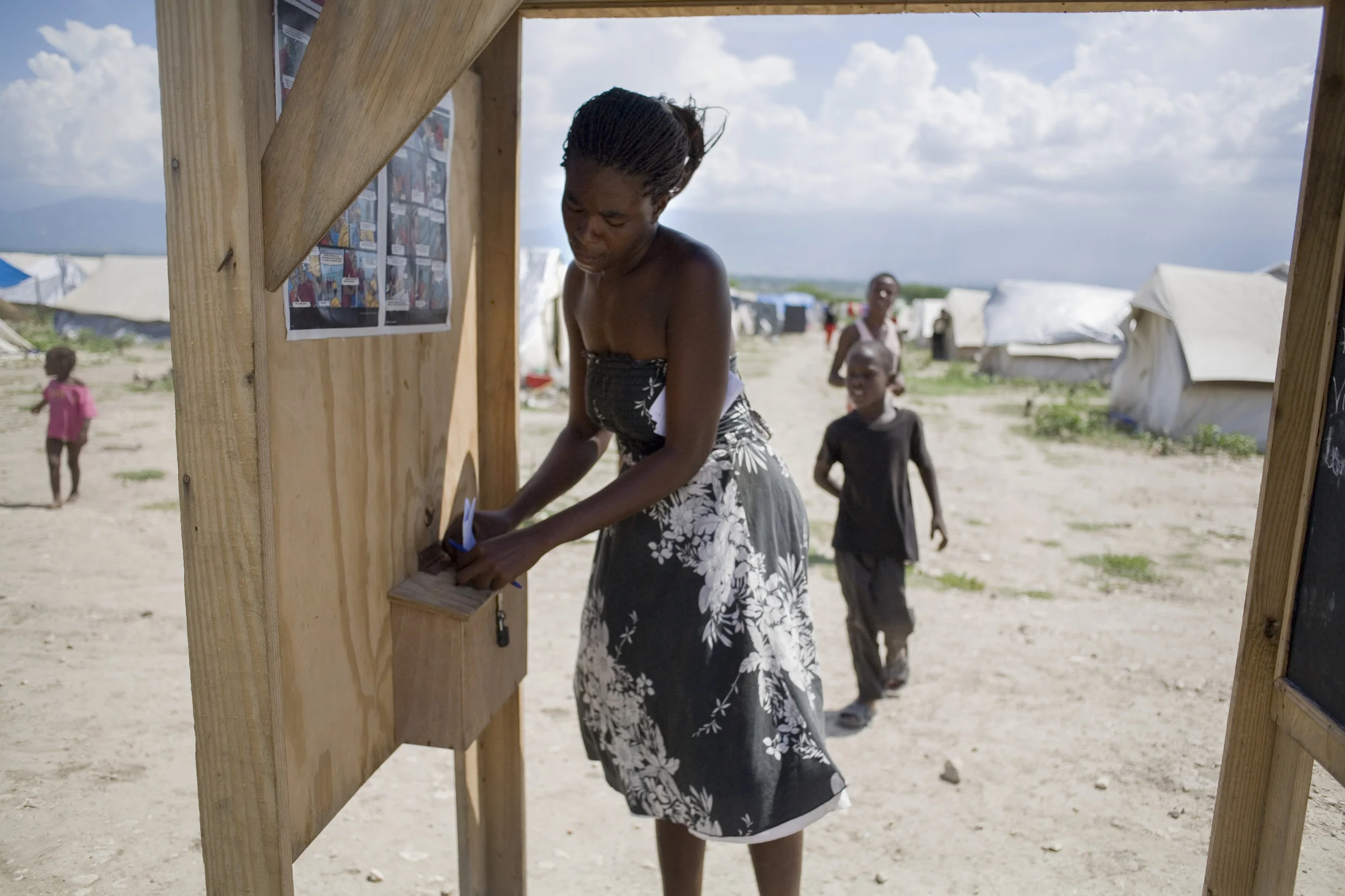 January 16, 2018 Haiti remembrance, day 4. Of all the stories I produced in Haiti, this ranks up with the ones I'm most proud of. The focus of the story was Sandra Felicien, a smart and strong new mother who was concerned for her children and wanted to help make the camp she was relocated to, Corail-Cesselesse more livable. She was responding to a project initiated by the #IOM for people in the camps to write their feelings by posting letters in post boxes they set up throughout the country. The project managers themselves were skeptical that anyone would write, however thousands did, flooding the boxes with their hopes, thoughts, concerns and many needs. One of the Times' earliest exploration of multimedia you can also read some of her writing and hear her voice by visiting this link: http://www.nytimes.com/20…/…/20/world/americas/20haiti.html