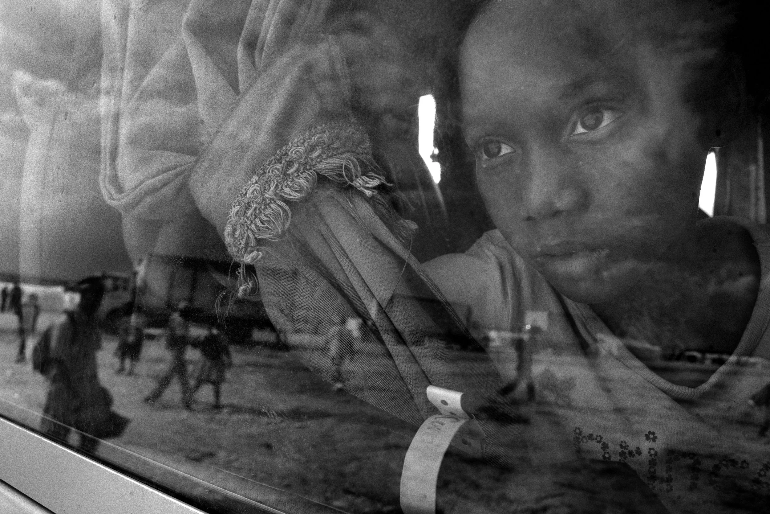 January 25, 2018 Haiti remembrance #7 I end this series of posts in the same place I began 7 pictures ago. This was the first moment a girl who was just arriving at the Corail-Cesselesse took in her austere surroundings in the camp that was shut off from so much of the rest of the nation. This place was supposed to be better, but it wasn’t, an epic failure of the United Nations to secure better living conditions for those who were displaced in the earthquake. I wish I knew what she was thinking—regardless I found her beautiful and strong and deserving of better. When I opened the shutter for this picture I wish she had been arriving at a better place where she could realize a life and all of its possibilities and thus further contribute to all of our lives collectively making this world a better place. To that end, we do not need aid, perse, but an ability to recognize people’s potential and invest in it. The returns will be worth it—@mcsquealien I had intended for these photos to be 7 consecutive photos, but I’m glad that they turned out as they have, addressing the unfortunate comments of this American president at length and not letting go of the need to keep pushing back over time. The conditions in Haiti are hard, but the people make it anything but a shithole. It seems like a lifetime ago that that disrespectful word was uttered. Since then there have been tremendous @womensmarch, a government shutdown, more incendiary comments by the president, and the #Dreamers and still holding on for the opportunity to keep #dreaming in this country. The momentum has to keep going, there’s no other option. On a personal note, my mom was also taken to the emergency room during this time. She’s fine. It was an overreaction to a cold, but in her 80s you can’t be too careful. A Haitian cab driver took us there and wasted no time in getting us to the emergency room. Needless to say I was thankful for his help and appreciate the fact that because of his efforts my mom got the care she needed when she needed it. He is a part of what makes this country great and I am thankful for the contributions that #Haitians and #Haiti makes to the #USA.