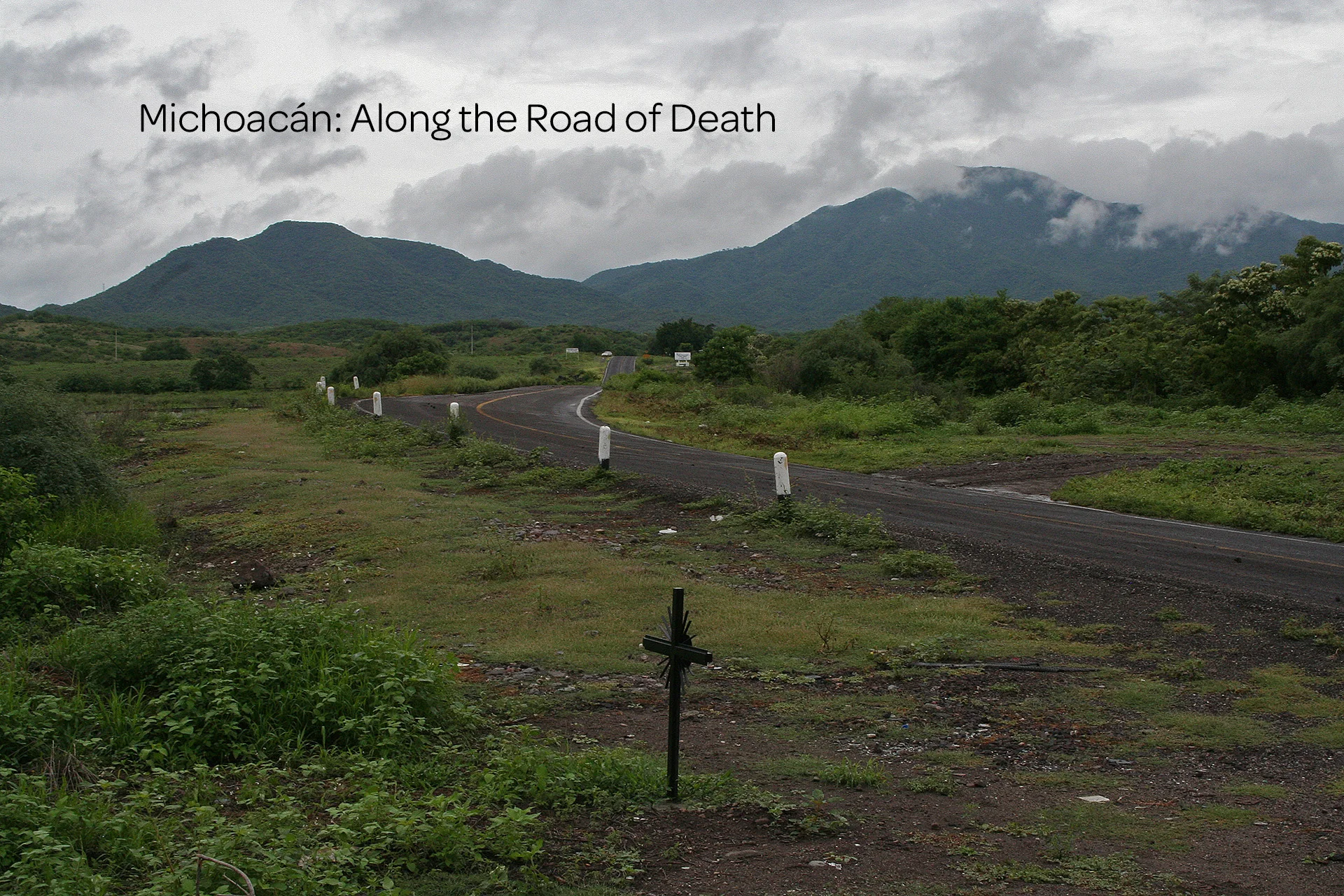 A black cross marks the grave of a narco who was decapitated. In 2006 alone nearly 400 people were killed in Michoacán State making it one of the most violent years on record. Little has changed since then.