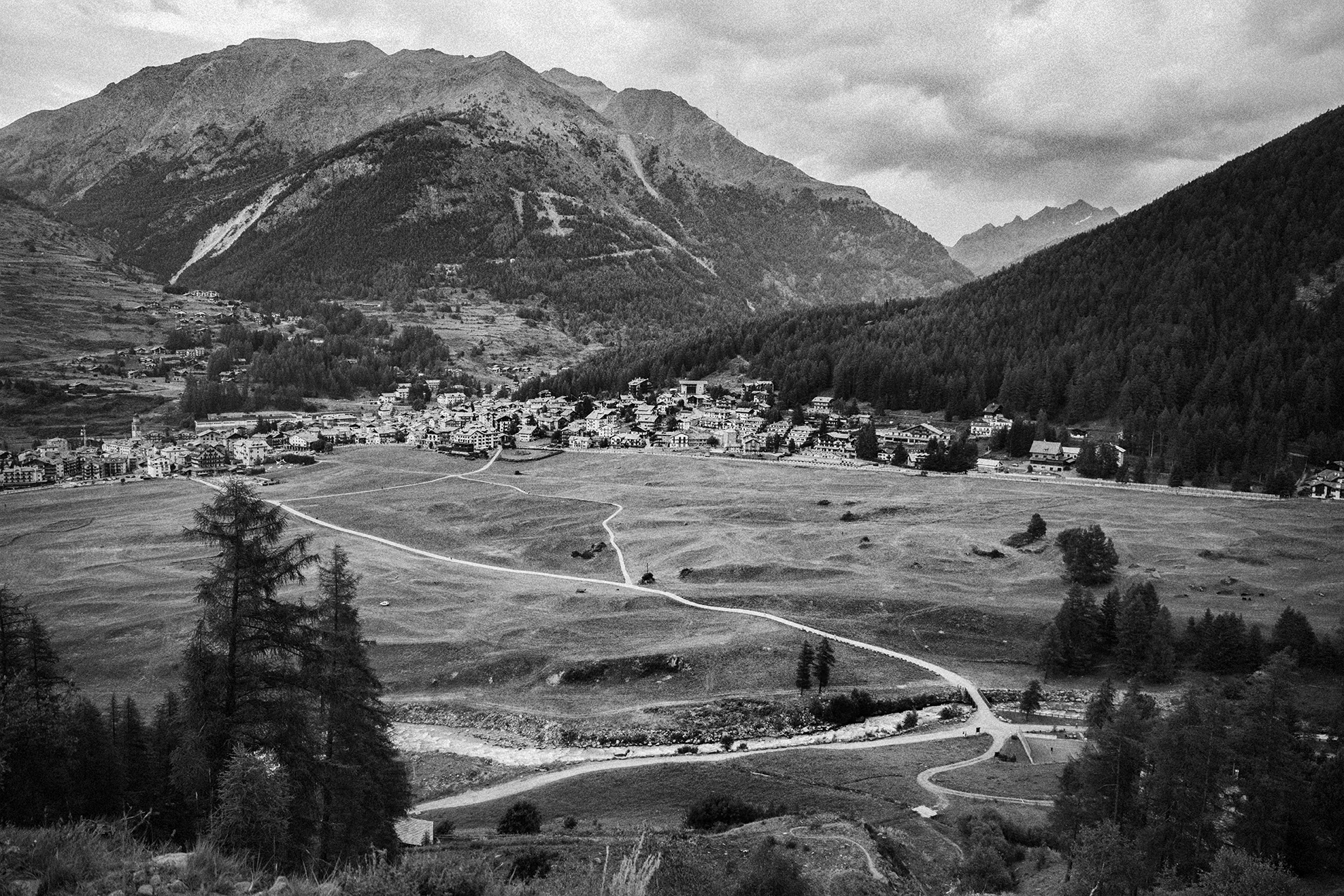 Cogne Valley . In Cogne valley chefs and farmers practice culinary traditions that can be traced back thousands of years. As peaceful as this view was I felt an urgent concern for this place. The mountains that surround the town are literally crumbling due to manmade climate change and trees are dying. The ecological breakdown above will adversely impact the town and valley below.