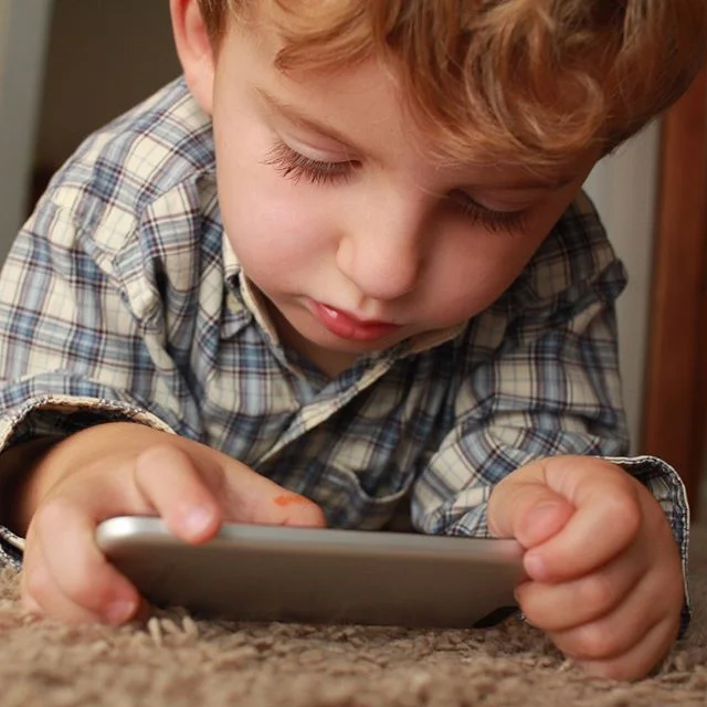 boy on carpet.jpg