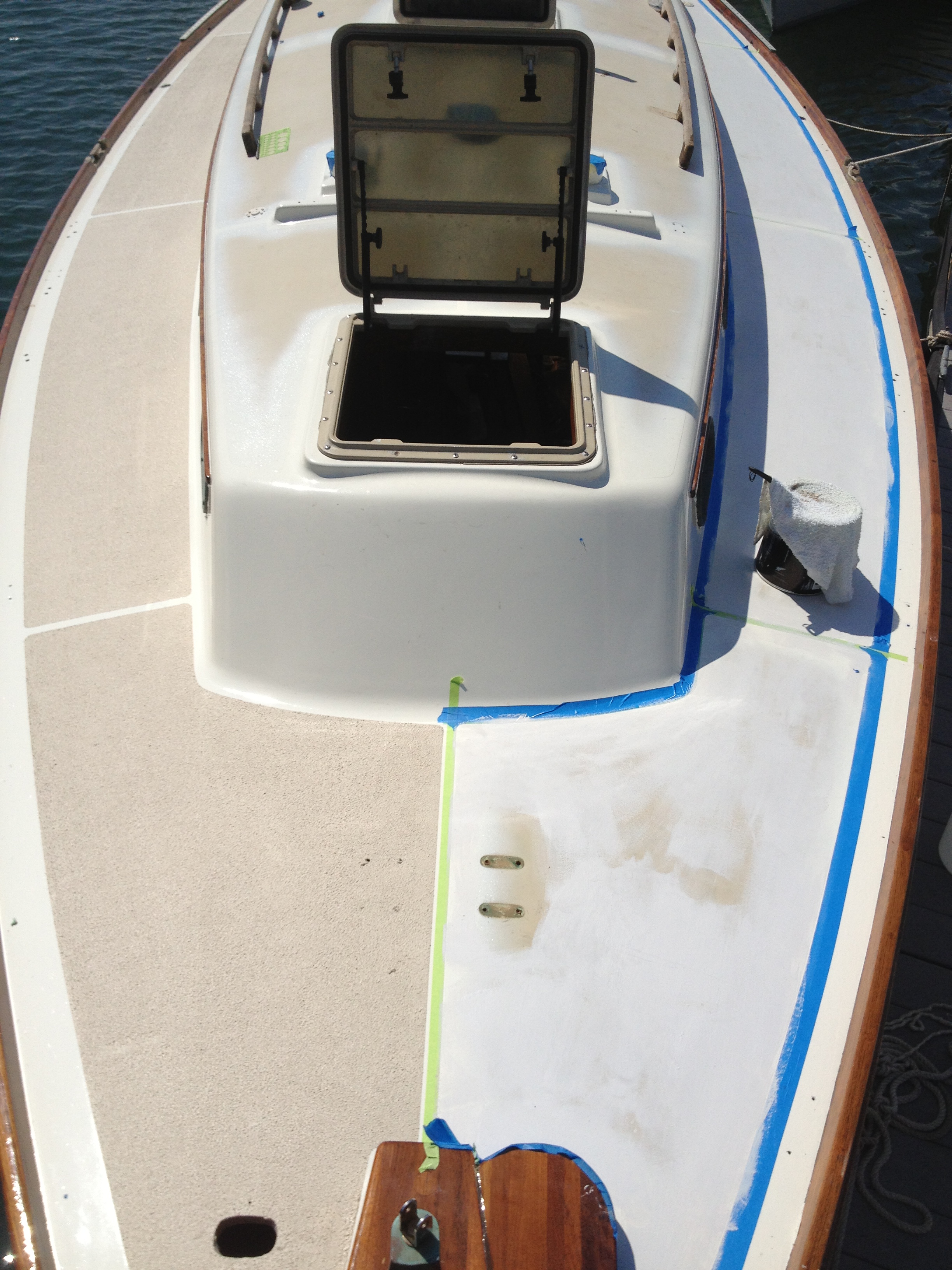  Starboard side done and the first coat of primer on the port side 