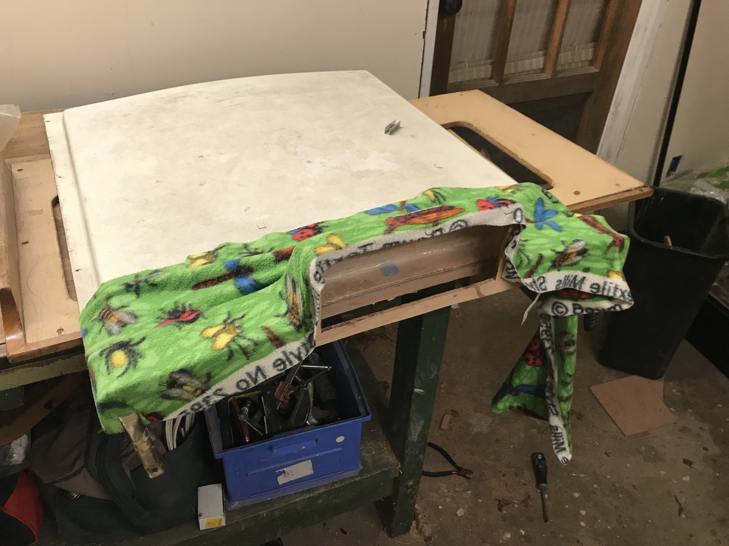  I stretched fleece over the frame.  Fleece can be stretched and pulled to make smooth curves. 