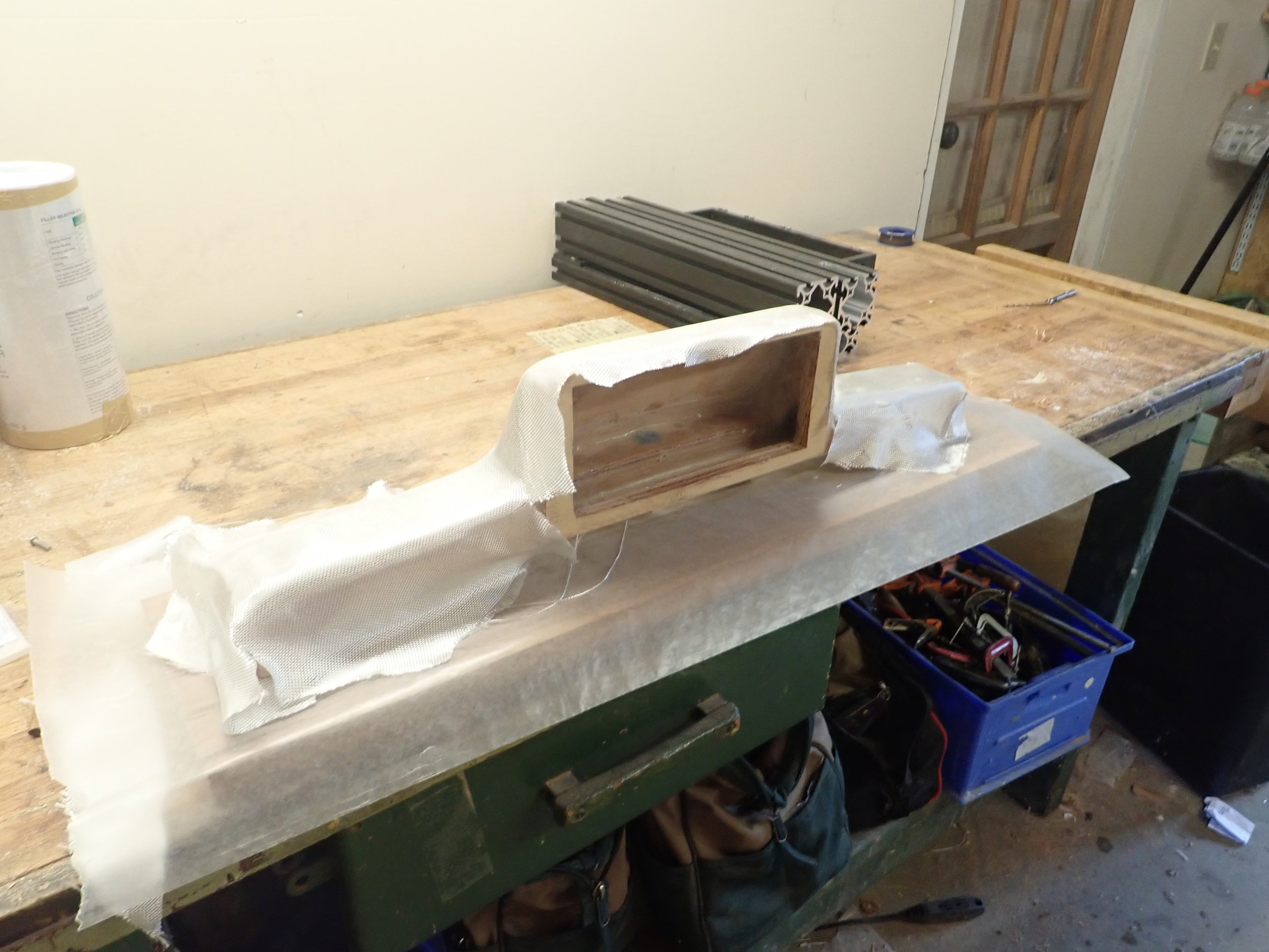  Cover it all with a layer of fiberglass cloth 