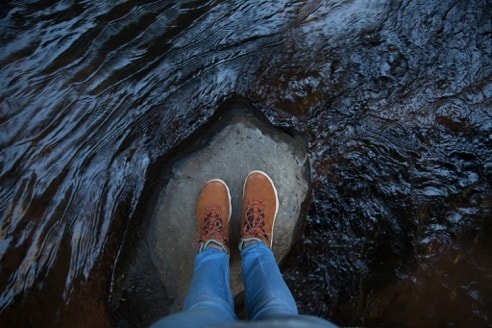 dried lava flow surrounding feet