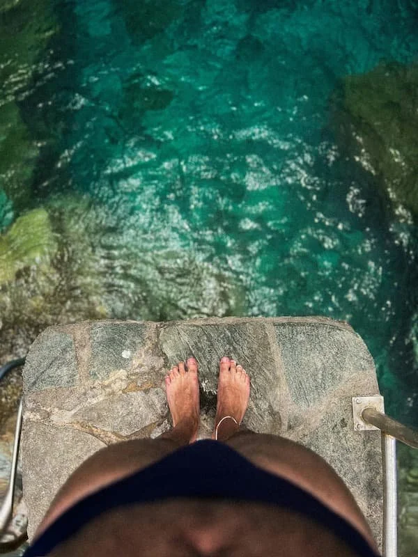 diver on a clif looking down