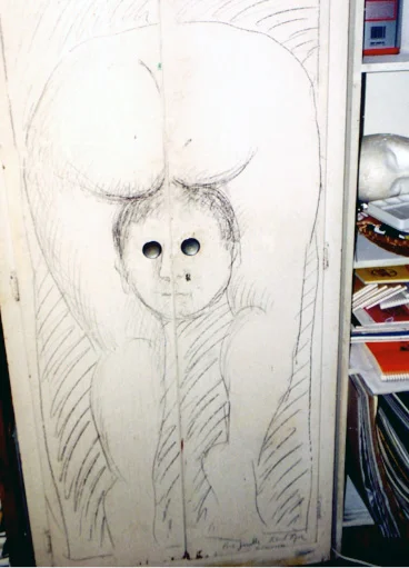 Upon seeing a cabinet in my art studio, Roland immediately made use of the drawer pulls to transform a five-dollar piece of furniture into a piece of art
