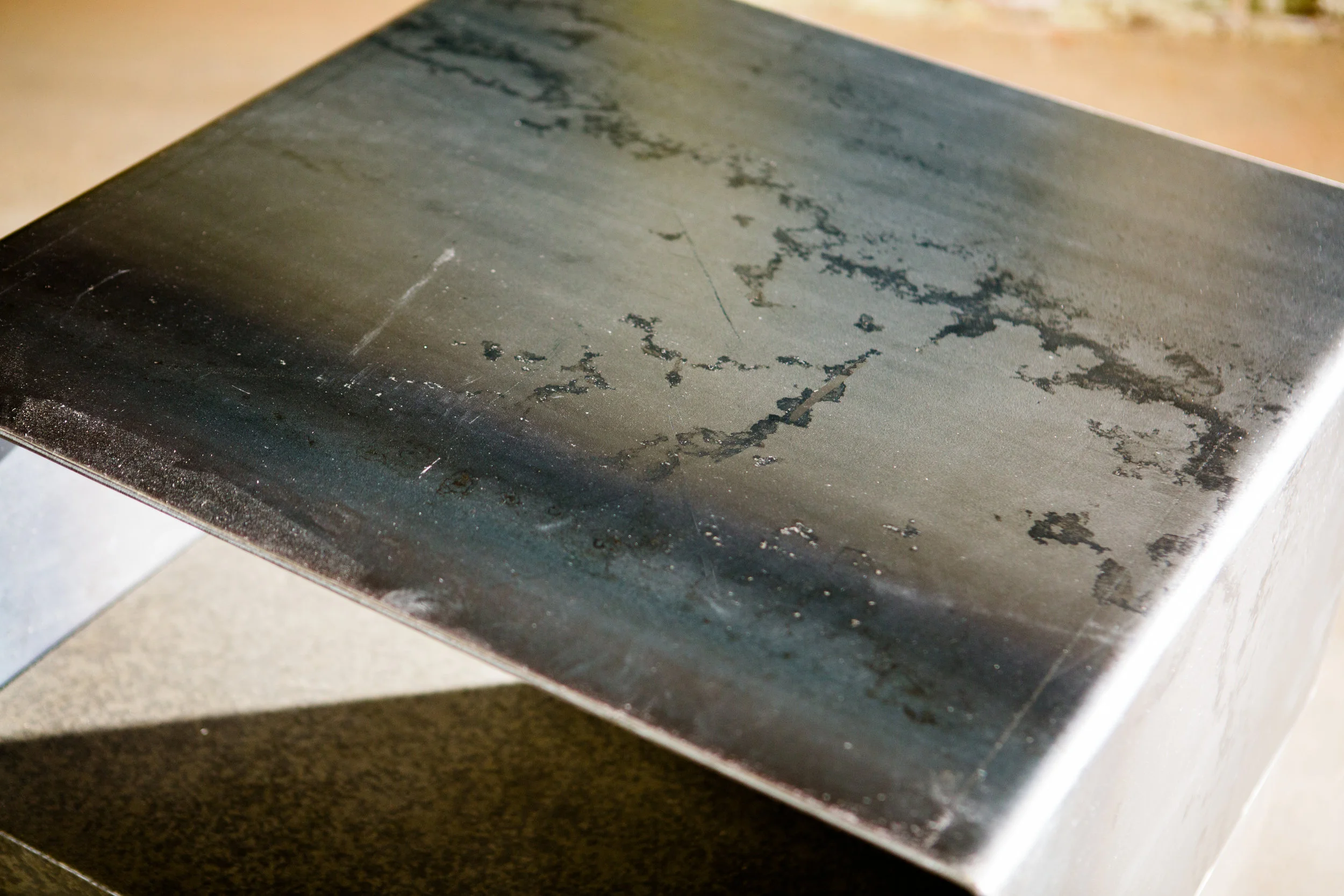 The natural variation in our waxed steel is subtle and beautiful. Many are surprised at how much visual life there is in the raw material. #furniture