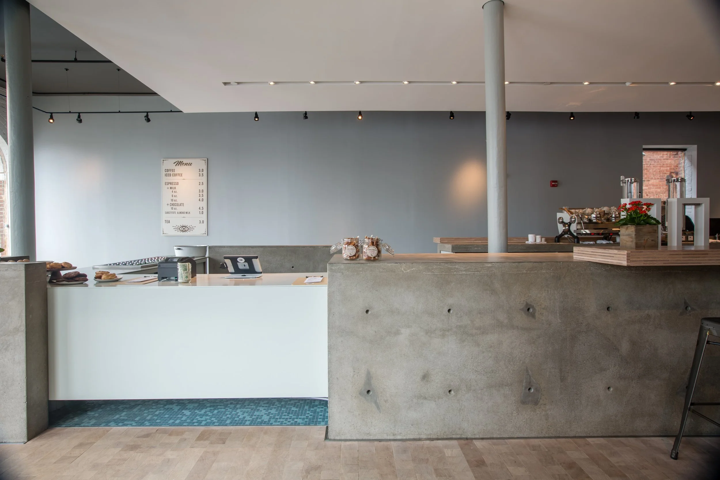 This was a massive project for a local coffee shop. There we wanting something true to the material used. All the concrete was old school formed with rebar reinforcement and wet cast with industrial concrete. The counters were so heavy the floors had to be reinforced before casting. #commercial