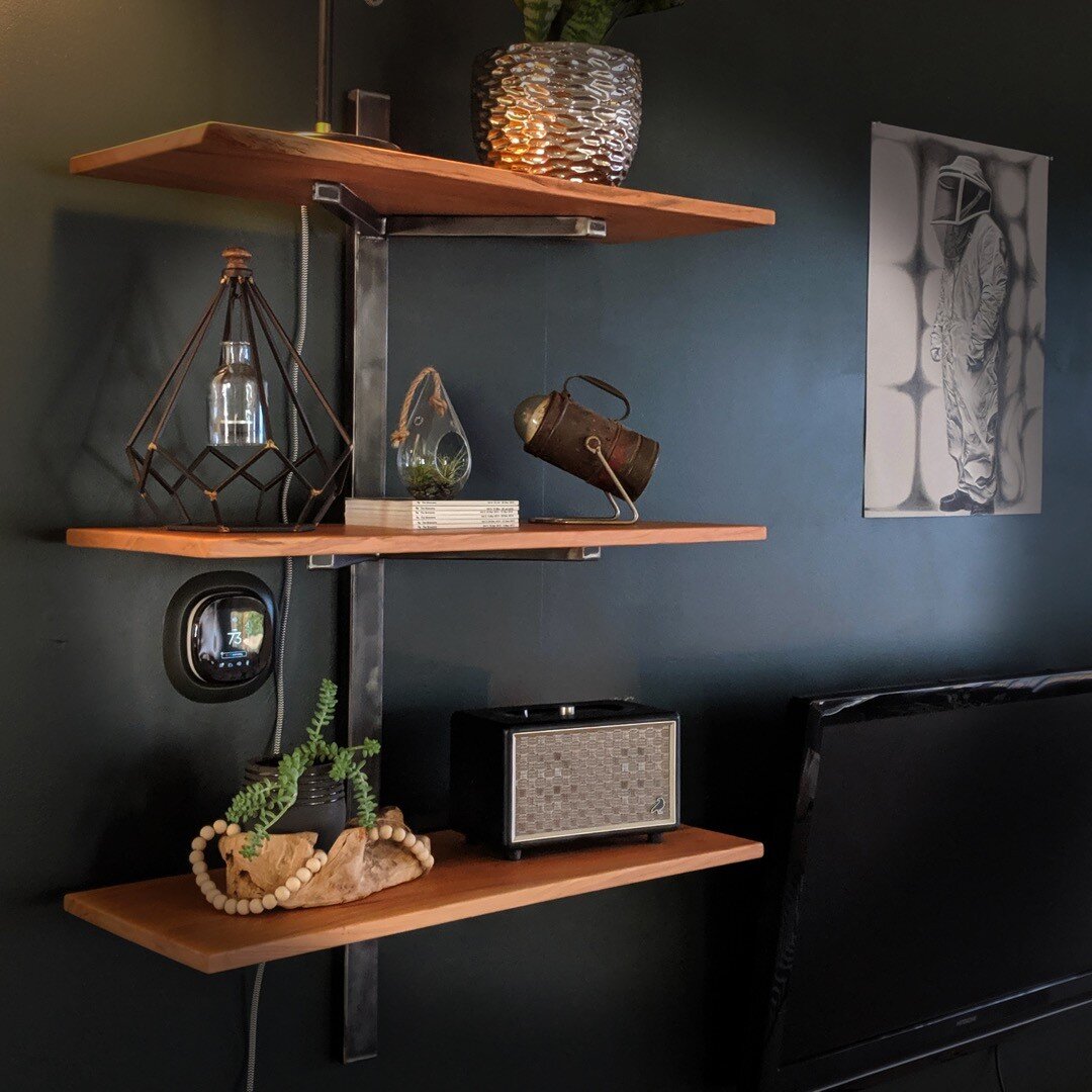 This is a set of shelves we through together for ourselves. A straightforward elegant design that gets the job done.