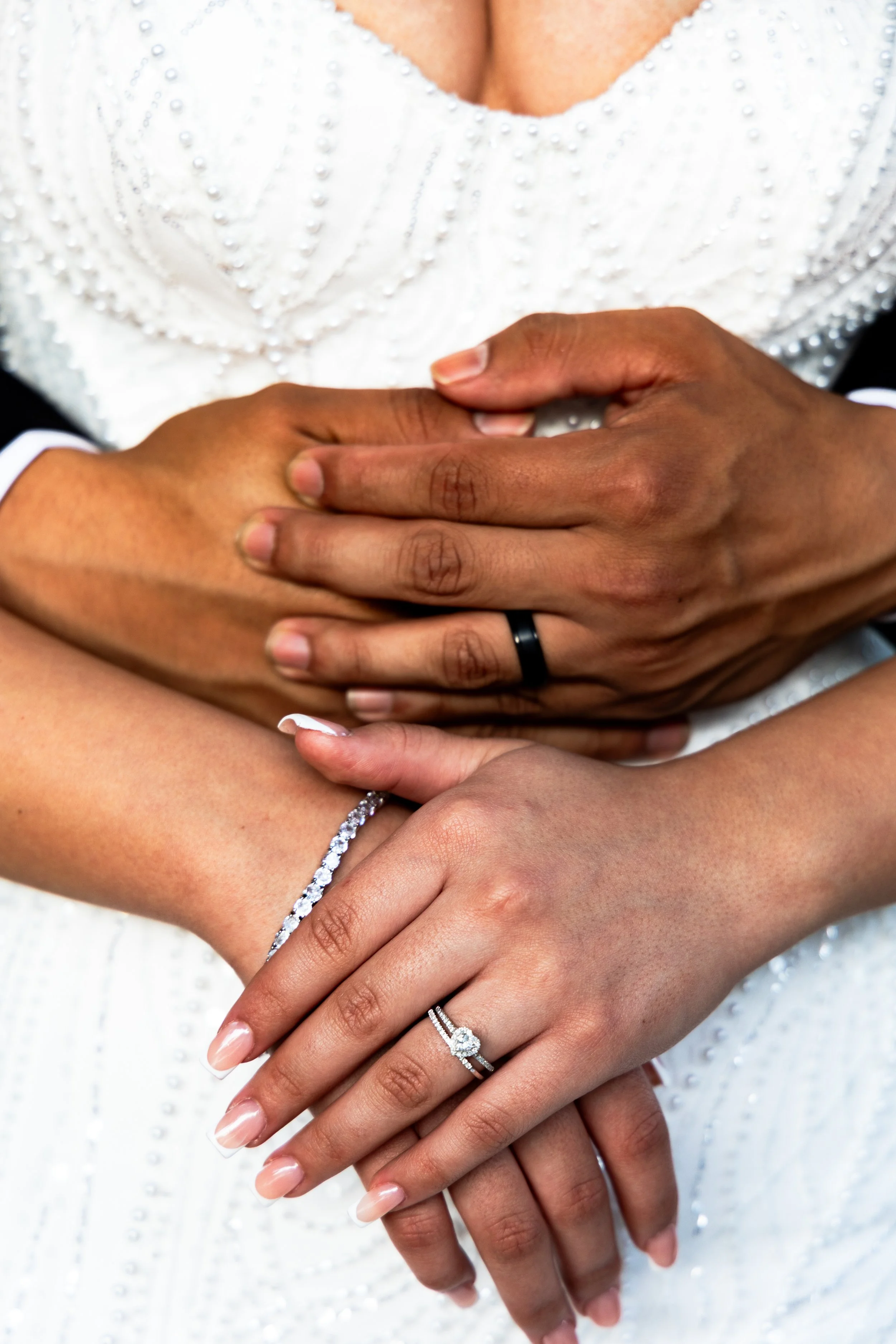 Emily and Eudardo showing rings