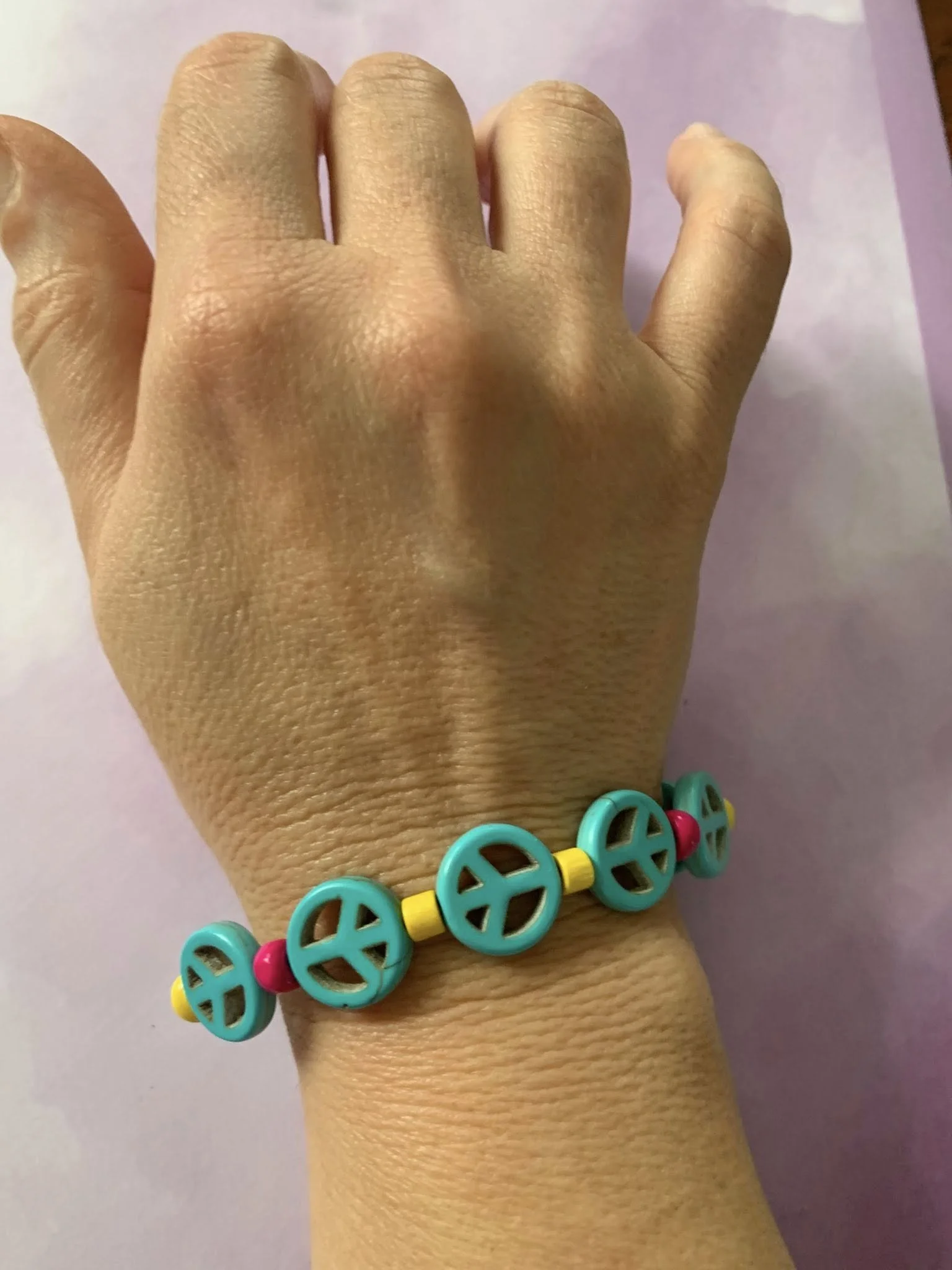 just peace bracele hand.jpg