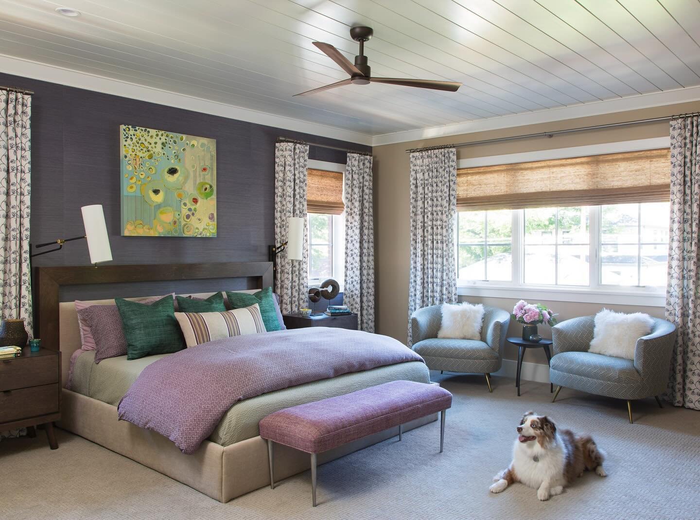 As dog lovers, we celebrate when a space gets the furry friend stamp of approval. A bedroom adorned with hues of purple, green, and blue seamlessly flows into a roomy, grounded bathroom, creating a serene haven that&rsquo;s bound to be adored by not 