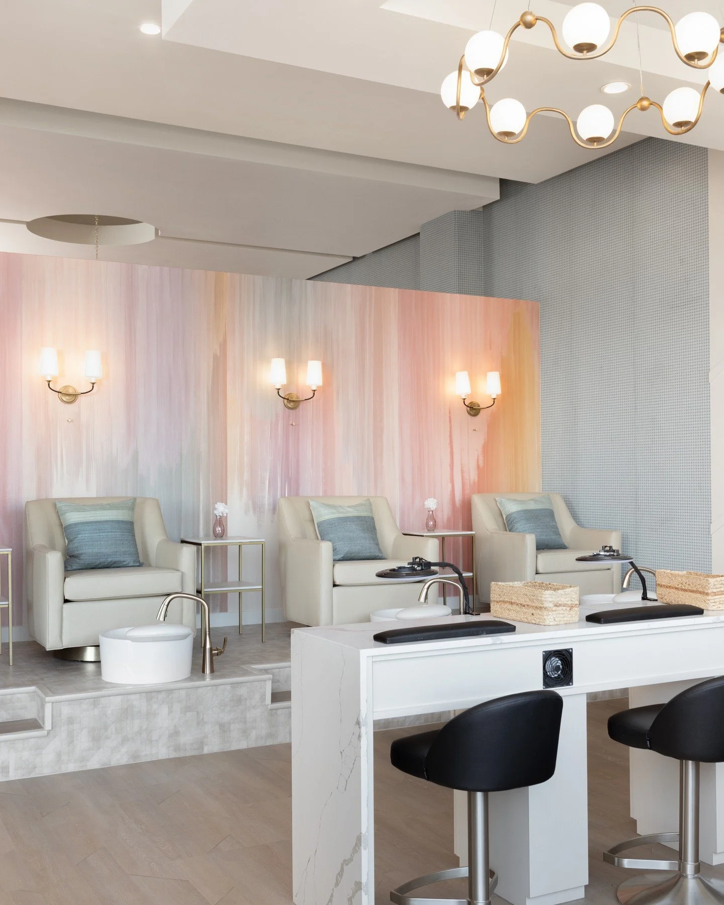 For this upscale Denver nail salon, @purluxebeautybar, we designed a space that feels polished yet inviting. A palette of soft pastels paired with modern textures creates an atmosphere that feels fresh, elevated, and unmistakably vibrant. Every desig