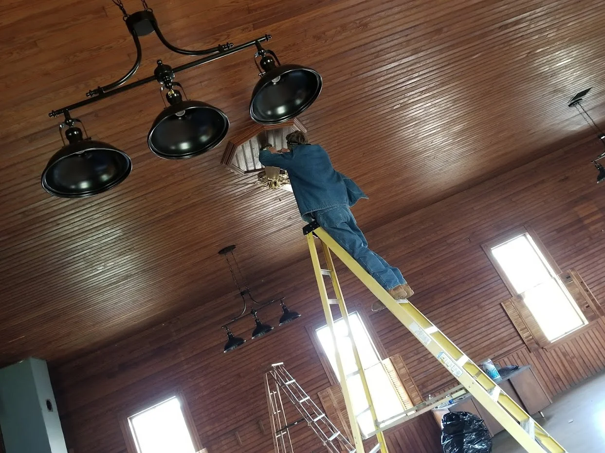 Fluorescent lights were replaced and an upgrade of the electrical upstairs completed.