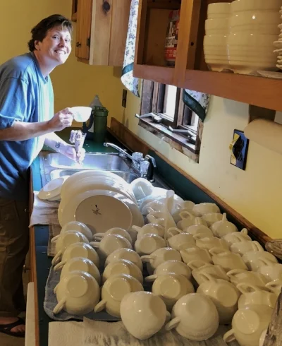 Prudy washes the teacup collection.