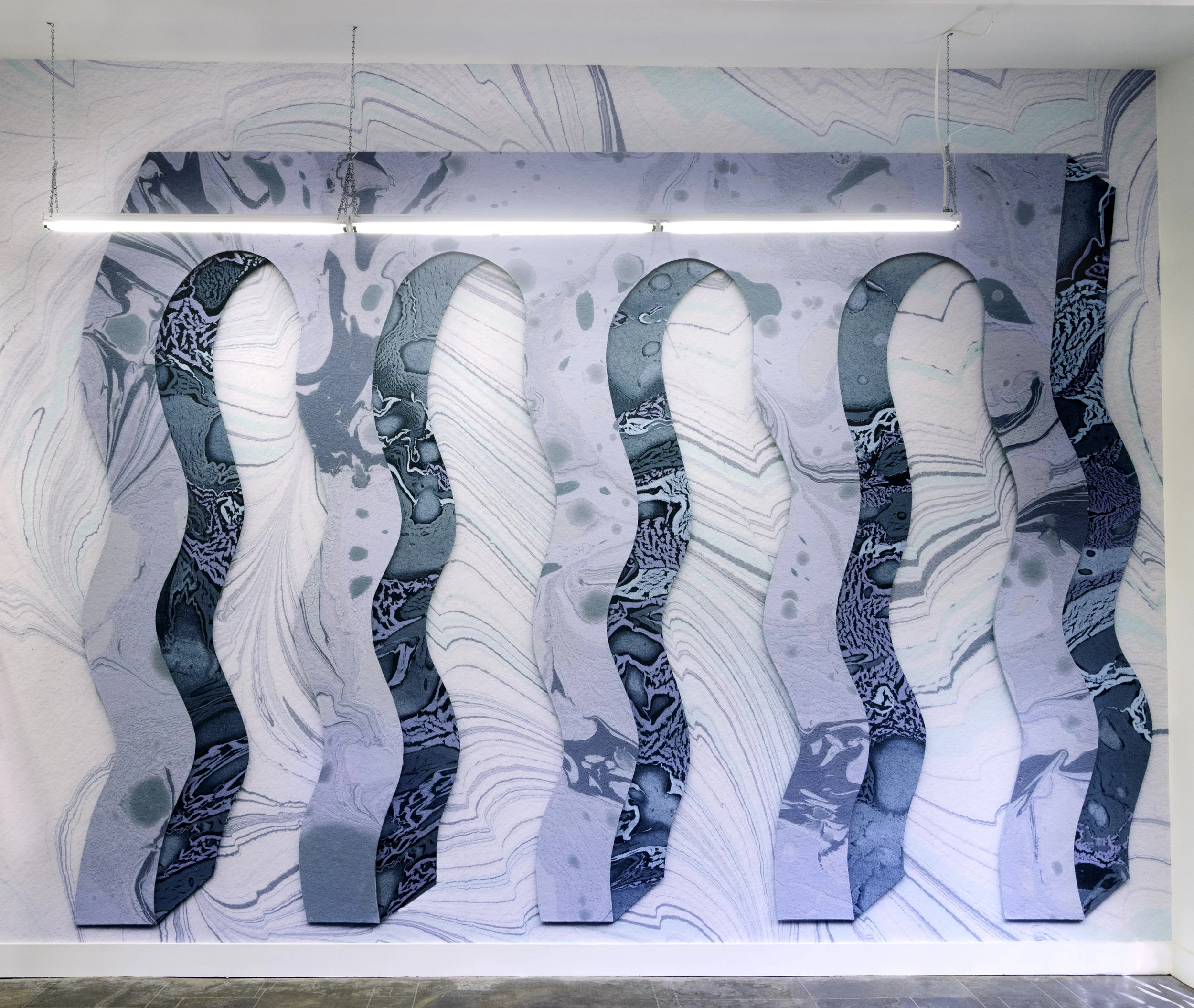 Wavy Colonnade , 2018 Porthole Portico , Two-person exhibition with sculptures by Jaime Lee Bull and wall works by Lauren Clay Camayuhs, Atlanta GA Press: Katie Geha, ArtForum,Critic’s Pick, April 2018 E.C.Flamming Burnaway, May 2018 From the press release: We are entering the regions of Dream. A time beyond history, where everyday life is imbued with mythology. Eat me - Glimpse a world existing outside of things known to the human spirit. Complicated rooms with stairs, ramps, windows, and secret doors. Sea like a mirror. See, well marked streaks of foam are blown along the direction of the wind. 13 is Shipwreck. Bridges and more stairs, leading to more rooms. Limitless. Never ending. Glittering abyss. This metaphysical world, nonexistent for us, this world beyond physical things, is the Porthole Portico. Jaime Bull splits her time between Atlanta and Athens. Bull looks to the ocean for inspiration. Her work walks a tightrope between Busby Berkley’s dazzling, synchronized choreography to conversely, falling off a Carnival cruise ship and drowning. There’s glitz, glitter and energetic dancing ladies but there’s also slumping, over-fed obesity and the futile treading of water. Bull received her MFA in Drawing and Painting from the University of Georgia, Athens in 2013. She is a recipient of the Willson Center for the Arts research grant for her thesis work Lady Beasts: An Investigation of Womanliness. She has exhibited in Atlanta with the Doppler Project, the Mint Gallery, the Mammal Gallery, Whitespace Gallery and at the Airport in Terminal E. Regionally, she has shown work at the University of North Georgia, Auburn University, and the COOP Gallery in Nashville. She is a Vermont Studio School Fellow and attended a two-month residency at the Bernheim Arboretum in Louisville, KY. She was featured in and on the cover of the 219th edition of Ambit Magazine, London. She currently teaches at the University of Georgia and is an Atlanta Contemporary Art Center Studio Artist. Lauren Clay, originally from Atlanta, now lives and works in New York. Clay makes sculpture and large wall works. Her site-specific wall installations warp and manipulate space using digitally printed vinyl photos of handmade collages. Her sculptures, painted plaster reliefs, also address metaphysical interactions with architecture. She received her MFA in Painting from Virginia Commonwealth University, and BFA in Painting from Savannah College of Art and Design. She has had solo exhibitions at the Rocky Mountain College of Art and Design, Denver; Larissa Goldston Gallery, New York; Whitespace Gallery, Atlanta, and Savannah College of Art and Design. Her work has been included in recent group exhibitions at Asya Geisberg Gallery, New York; Patrick Parish Gallery, New York; and Sometime Salon, San Francisco. Clay’s work has been written about in the New York Times, Bomb Magazine, Art in America, and Sculpture Magazine. Her artist book, Subtle Body, published by Small Editions, is included in the library collections of The Metropolitan Museum of Art, The Whitney Museum of American Art, and The Brooklyn Museum of Art.
