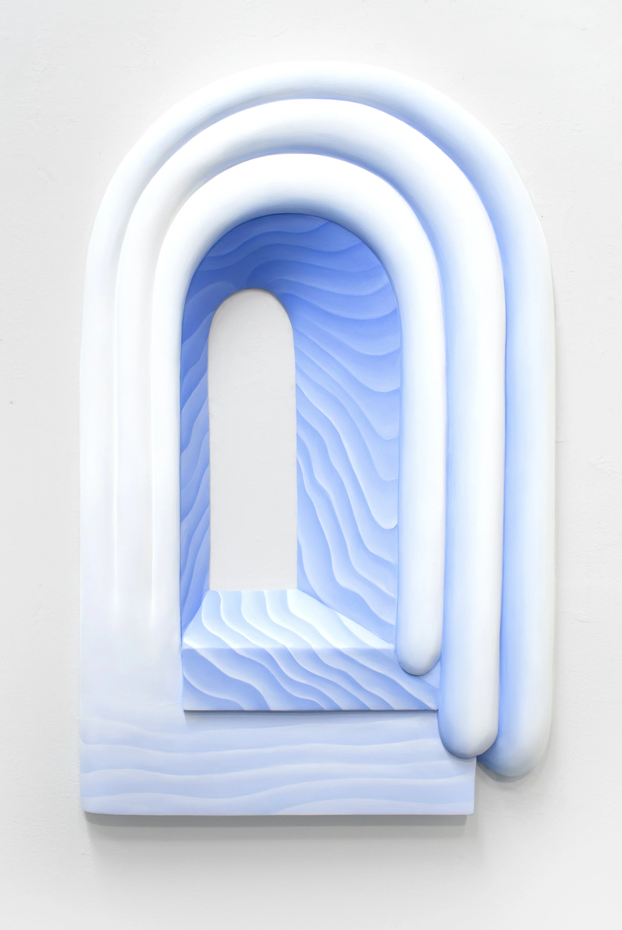 Illuminator, 2025, oil paint on carved panel, 25 x 15.5 x 2 inches
