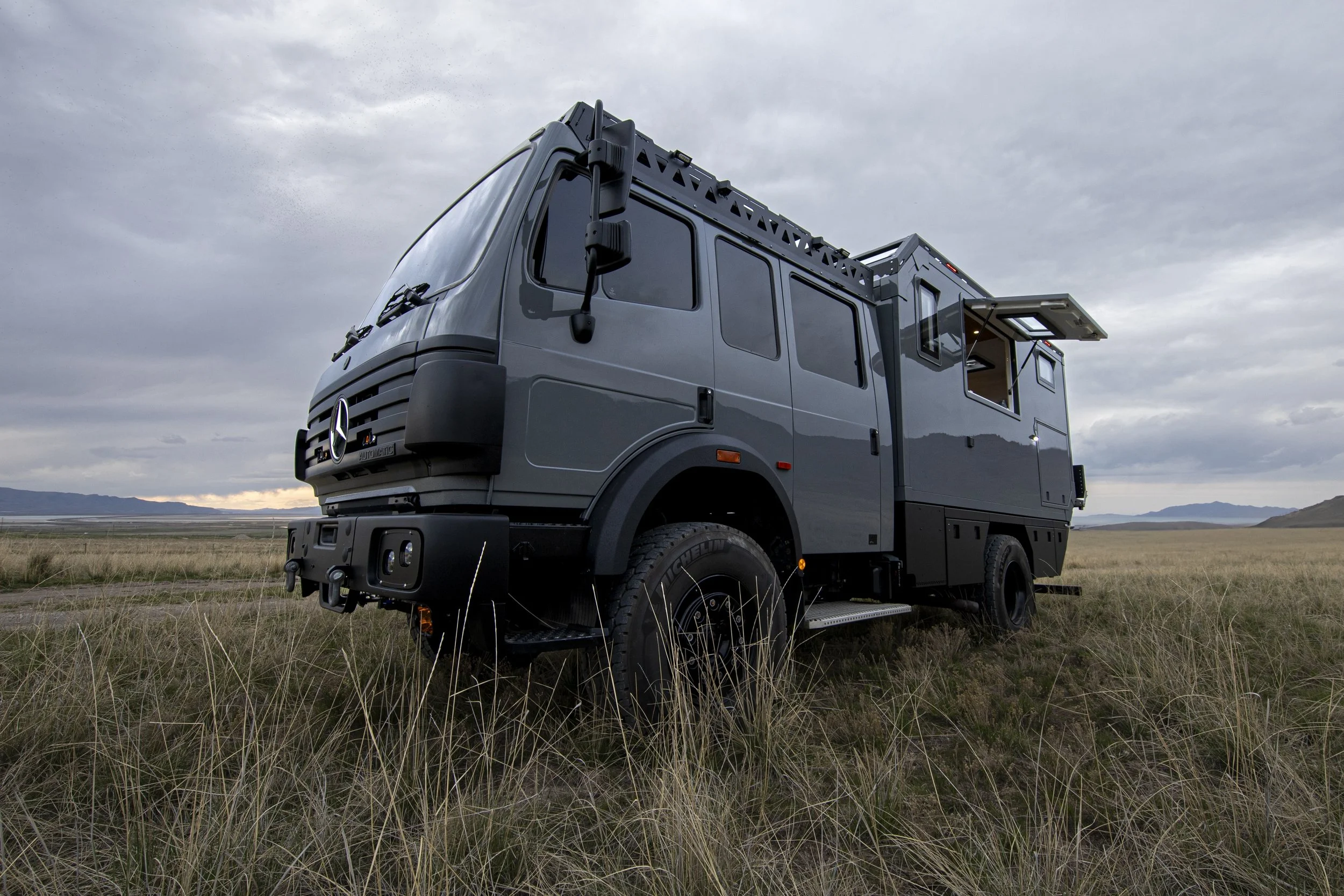 Custom-built expedition vehicle offroading 4x4 truck