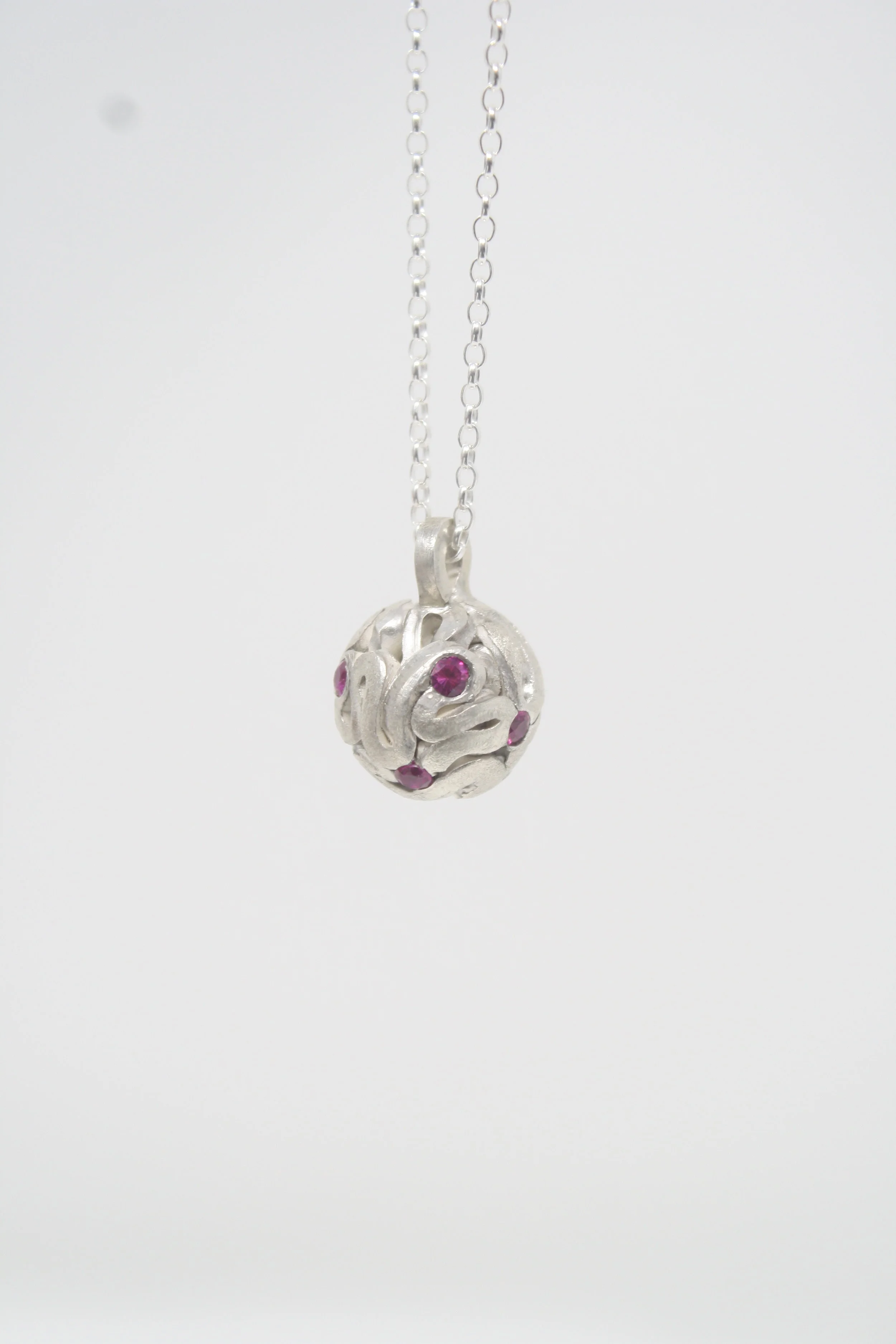 Tangled sphere pendant