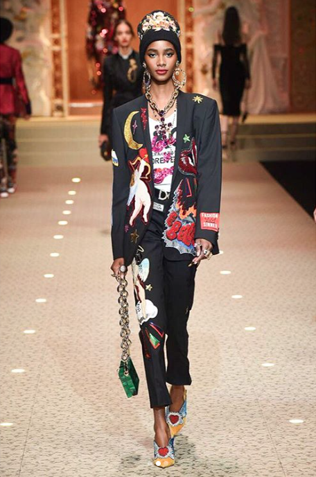 Who: Tami Willians | @TamaWilliamsOfficial Where We Spotter Her: Giorgio Armani, Dolce & Gabbana, Agnona