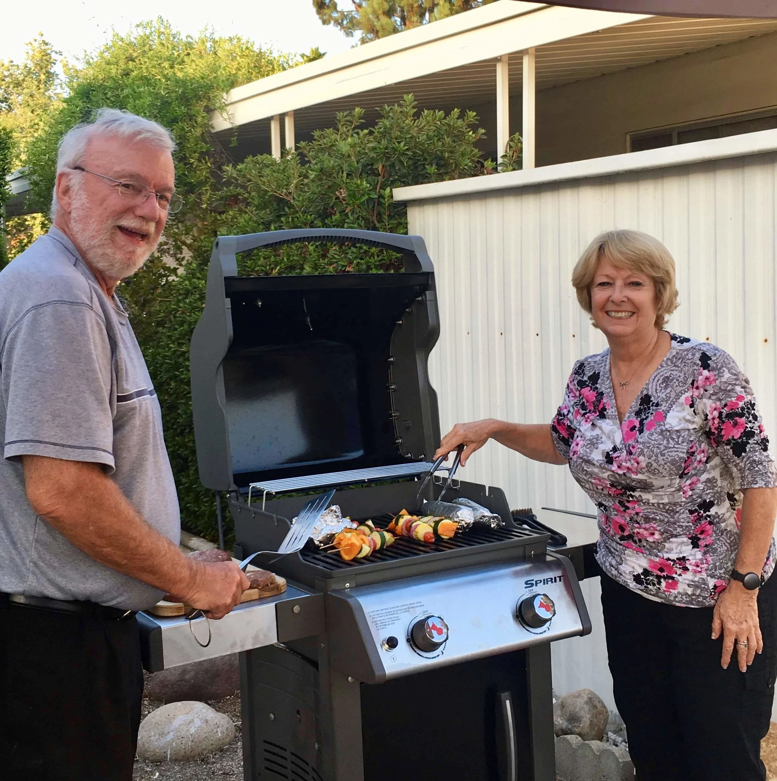 Two people working one grill is a true measure of teamwork