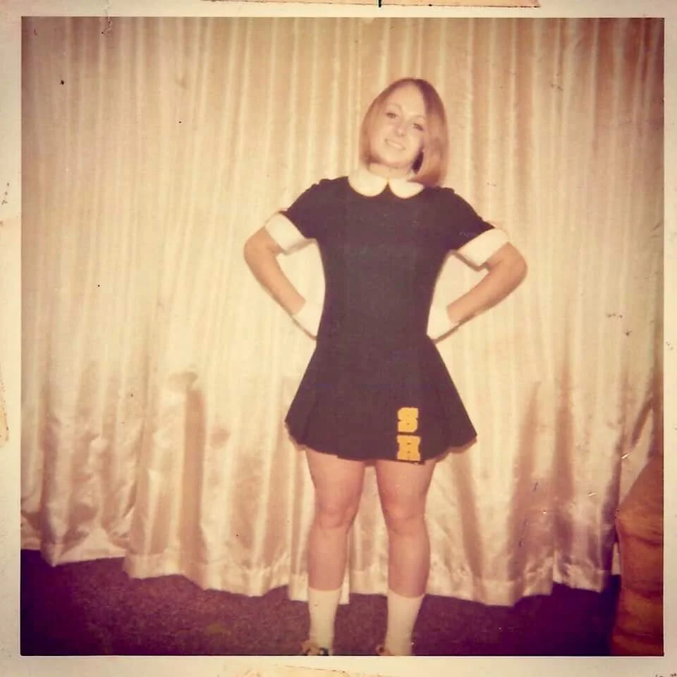 Shouldn't she have been the head cheerleader? Just look at those...
