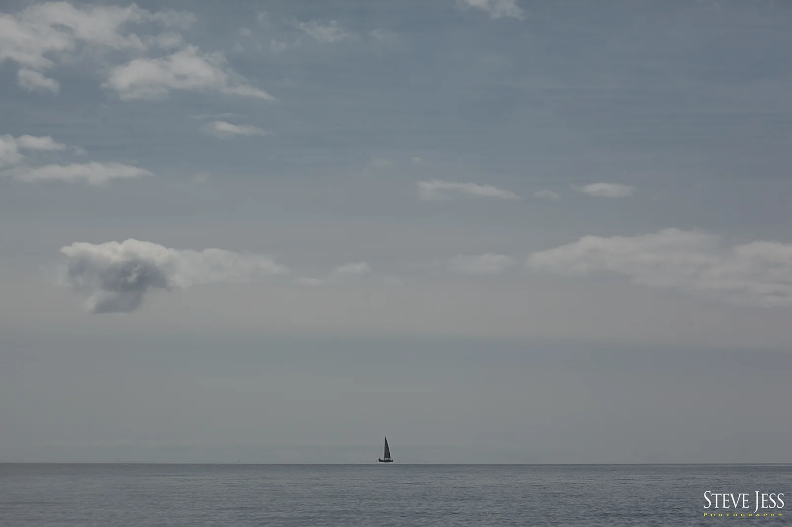 I don't believe this lone sailboat was part of the race but made a great " photo-op "