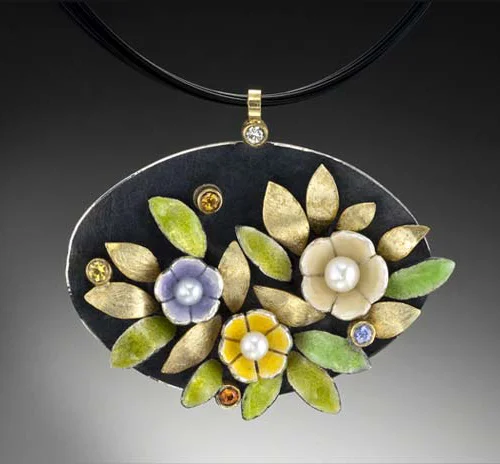 Oxidized sterling silver, fine silver, 18k, vitreous enamel, colored sapphires, diamond, freshwater pearls, resin.