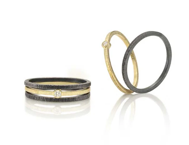 Diamond band, 0.03 ct. diamond set in 18k gold, brushed or hammered texture; Oxidized sterling silver band, square stock with hammered texture.
