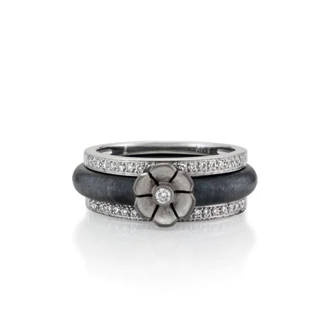 Flower ring, oxidized sterling silver, 18k white gold with 0.03 ct. diamond; Diamond bands, 14k white gold with 1/10 ct. tw.