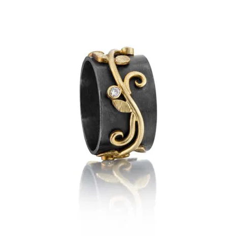 Oxidized Sterling silver, 18K gold, 0.03 ct. diamonds.