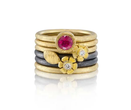 Oxidized Sterling silver, 18K gold, ruby, and diamonds. 