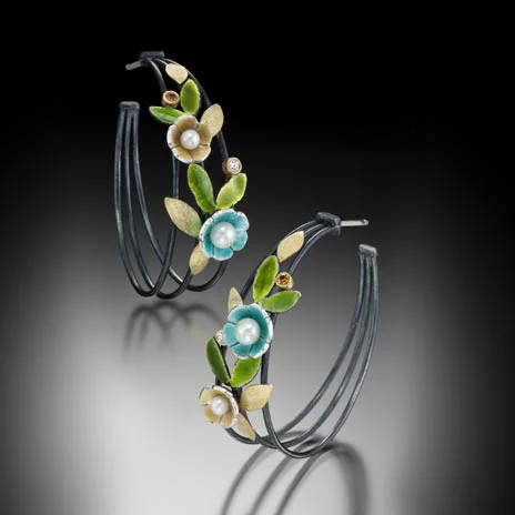 Oxidized sterling silver, fine silver, 18k, vitreous enamel, colored sapphires, diamonds, freshwater pearls, resin.