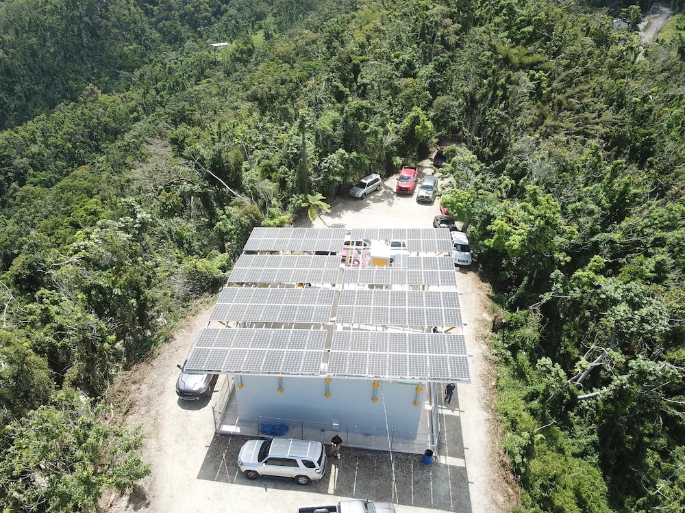 After deciding to install solar, the Montellanos community built the infrastructure to mount the panels directly on top of the water tank for the town, demonstrating committed ownership of the project.