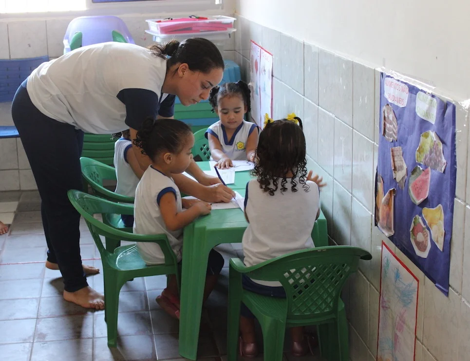 Aline teaches some of the youngest students at the House of Hope, which is operated by the church in the slums of Recife.