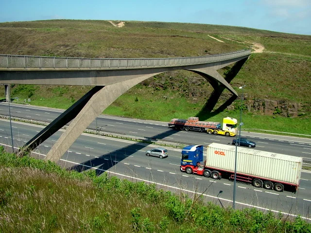  The high Pennine Way footbridge that spans the M62