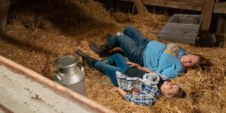 Sam-and-Tricia-Laying-in-the-Barn-During-a-Storm-on-Somebody-Somewhere.jpg
