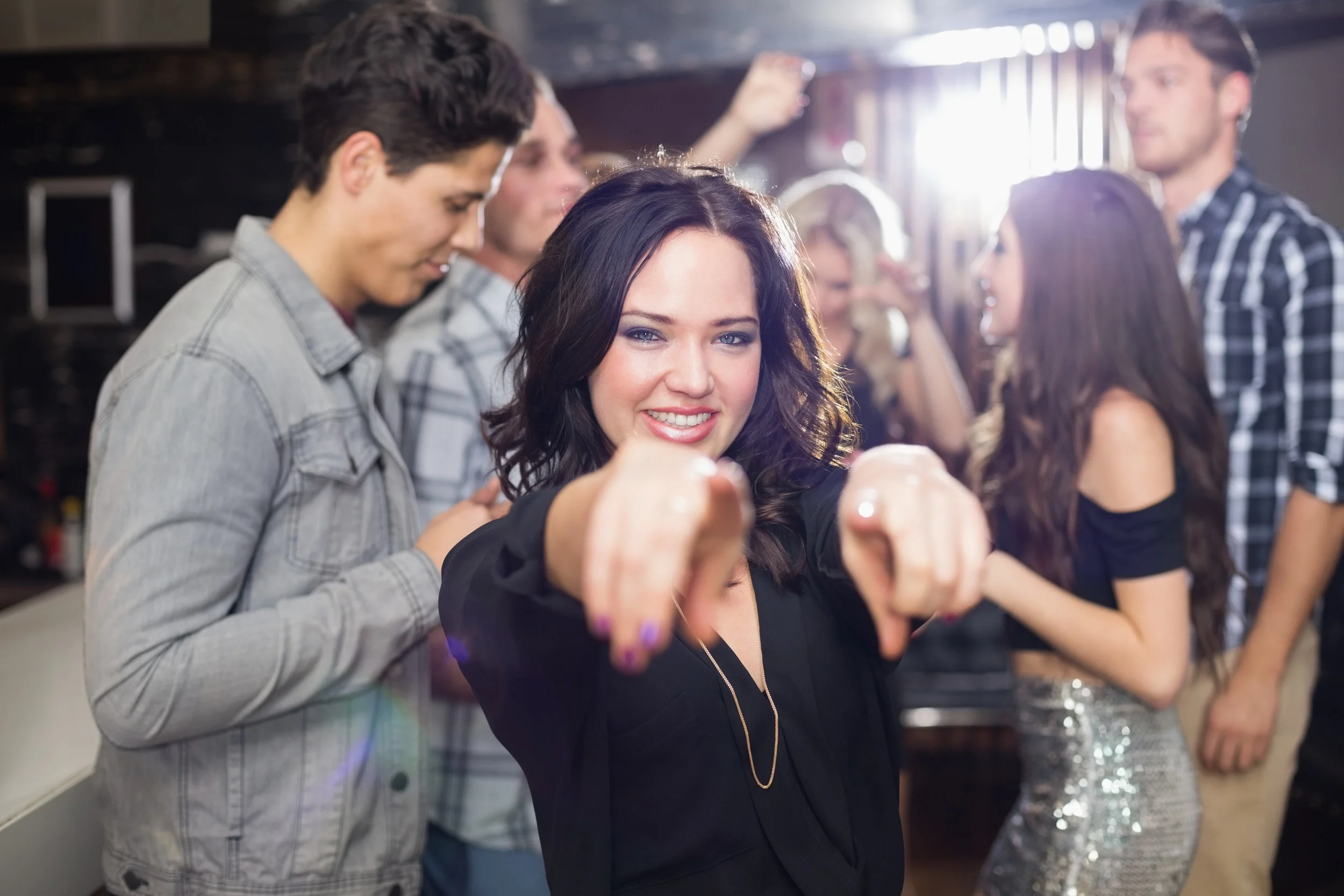 photodune-9392142-stylish-brunette-smiling-and-dancing-at-the-bar-xxl.jpg