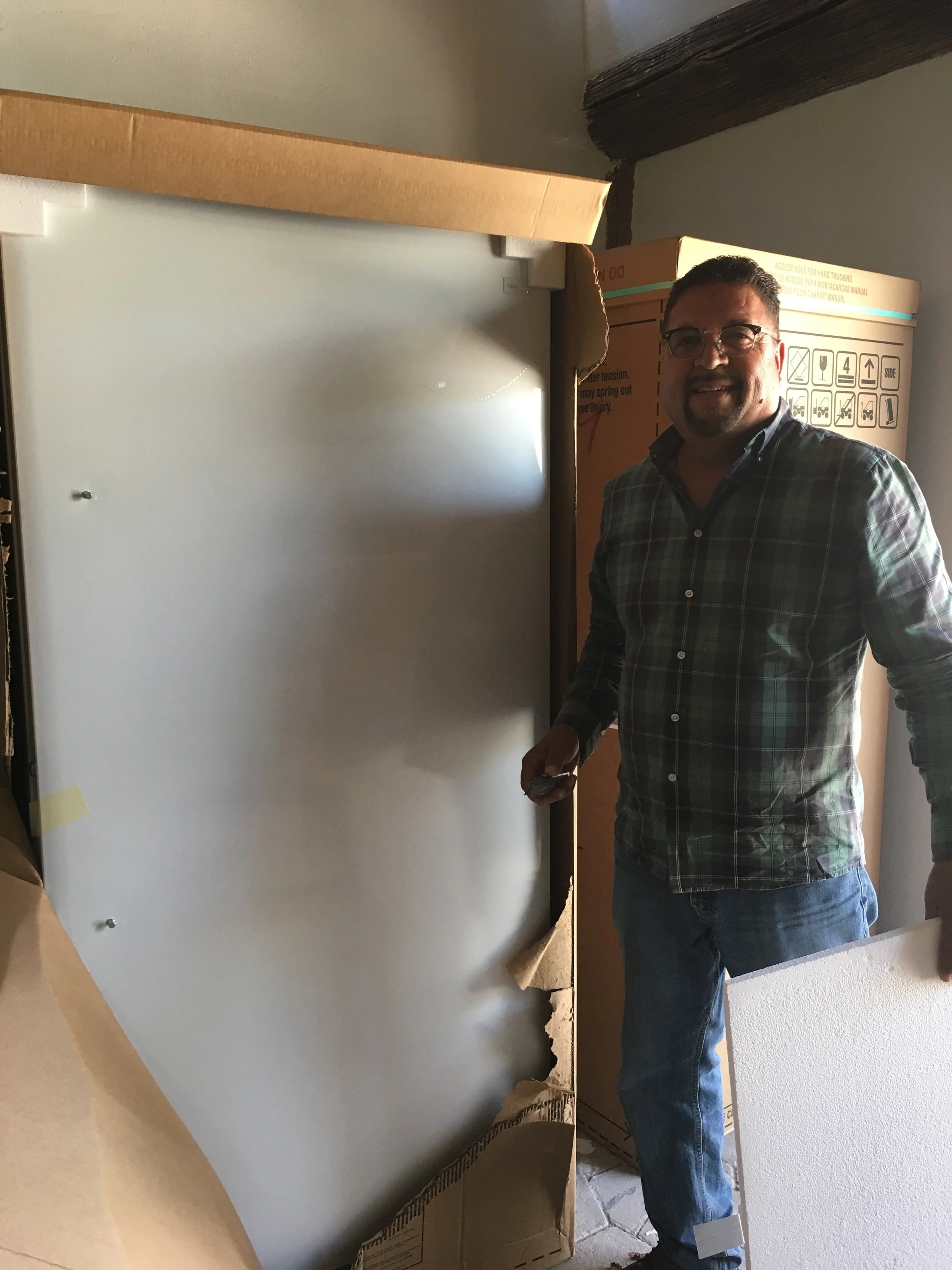 Pastor Sosa with one of the new freezers