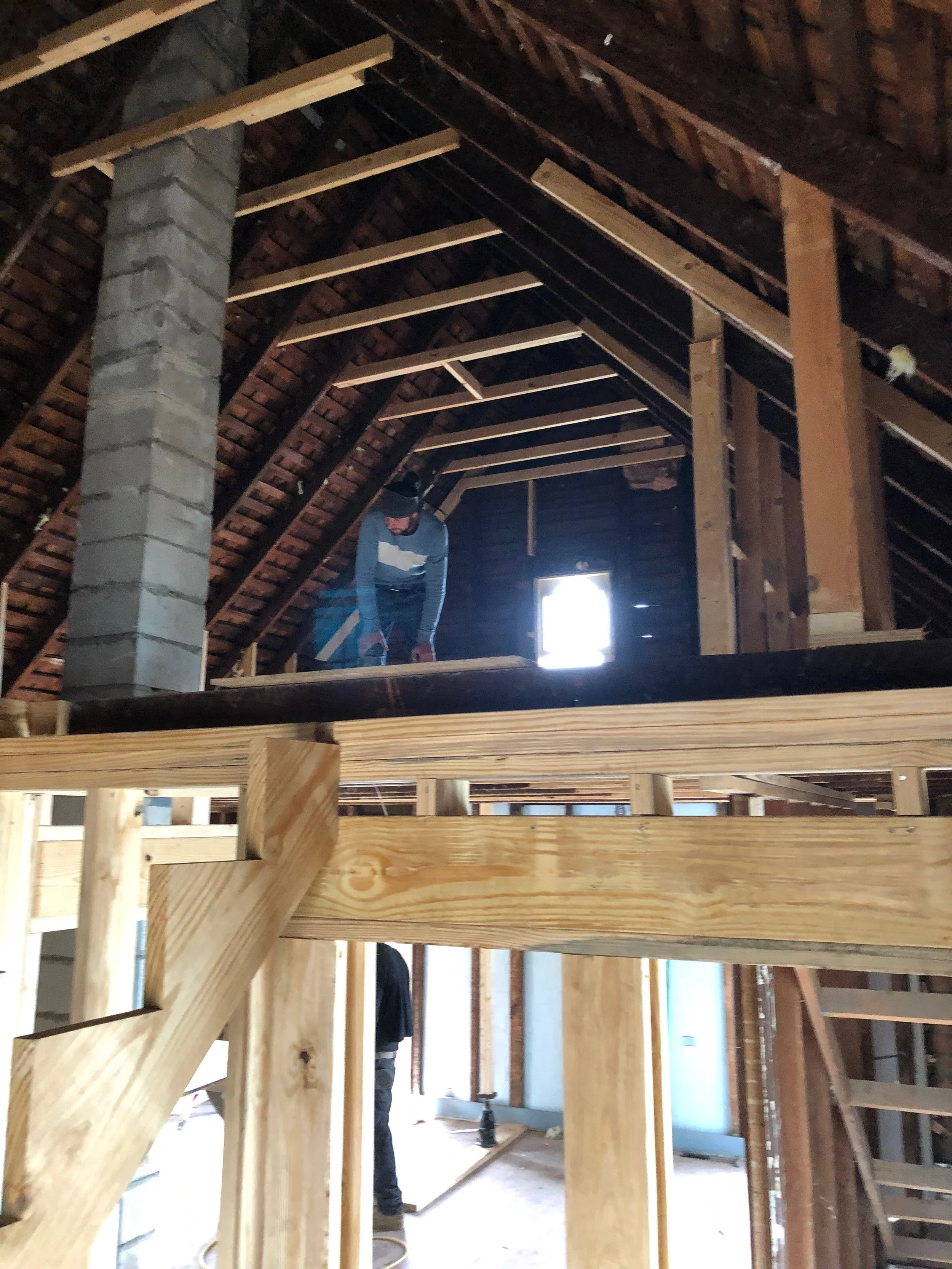 Layikng down 3rd floor subfloor.JPG