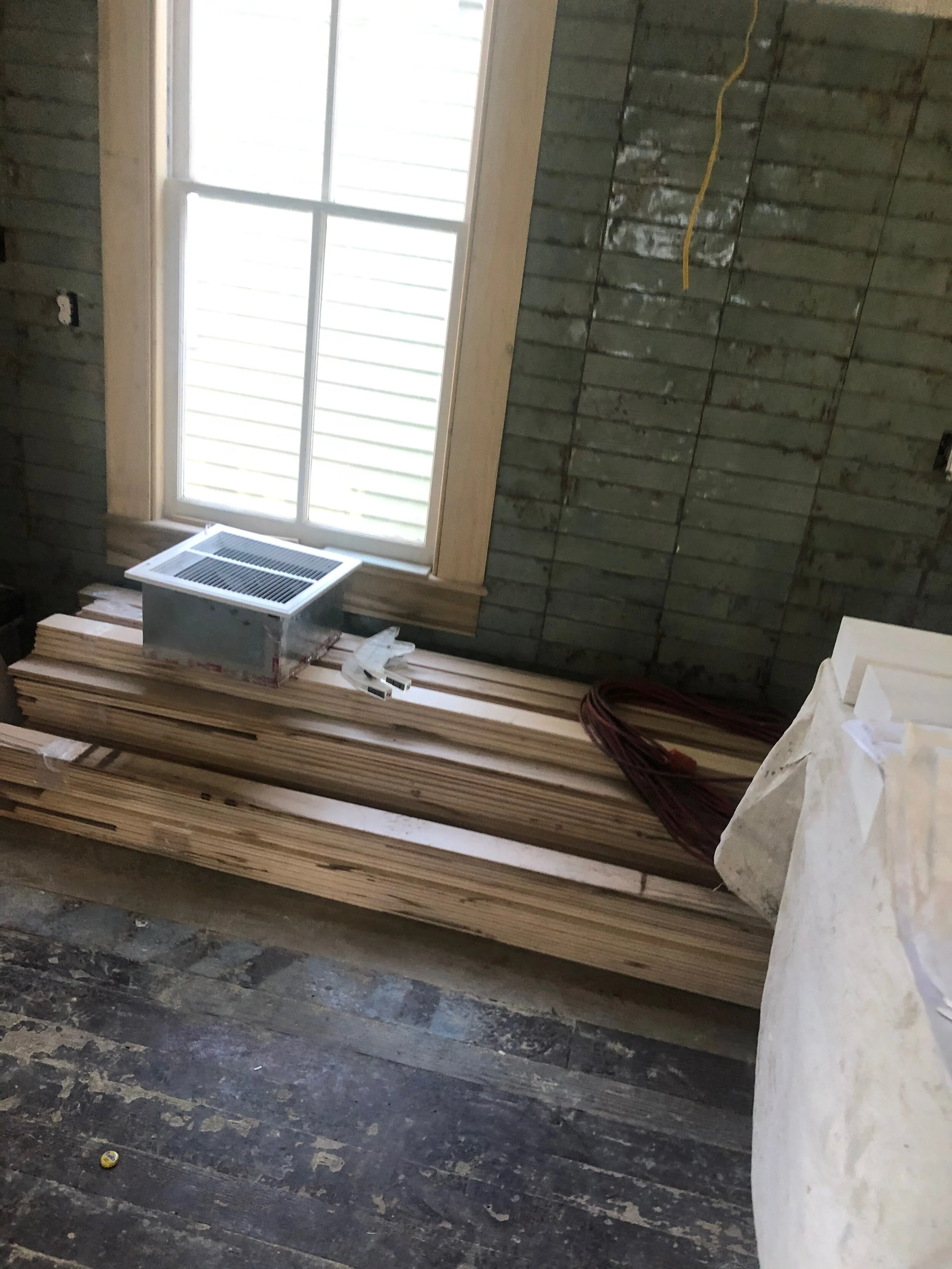 Kitchen Progress with Finished Tile in Background.jpeg