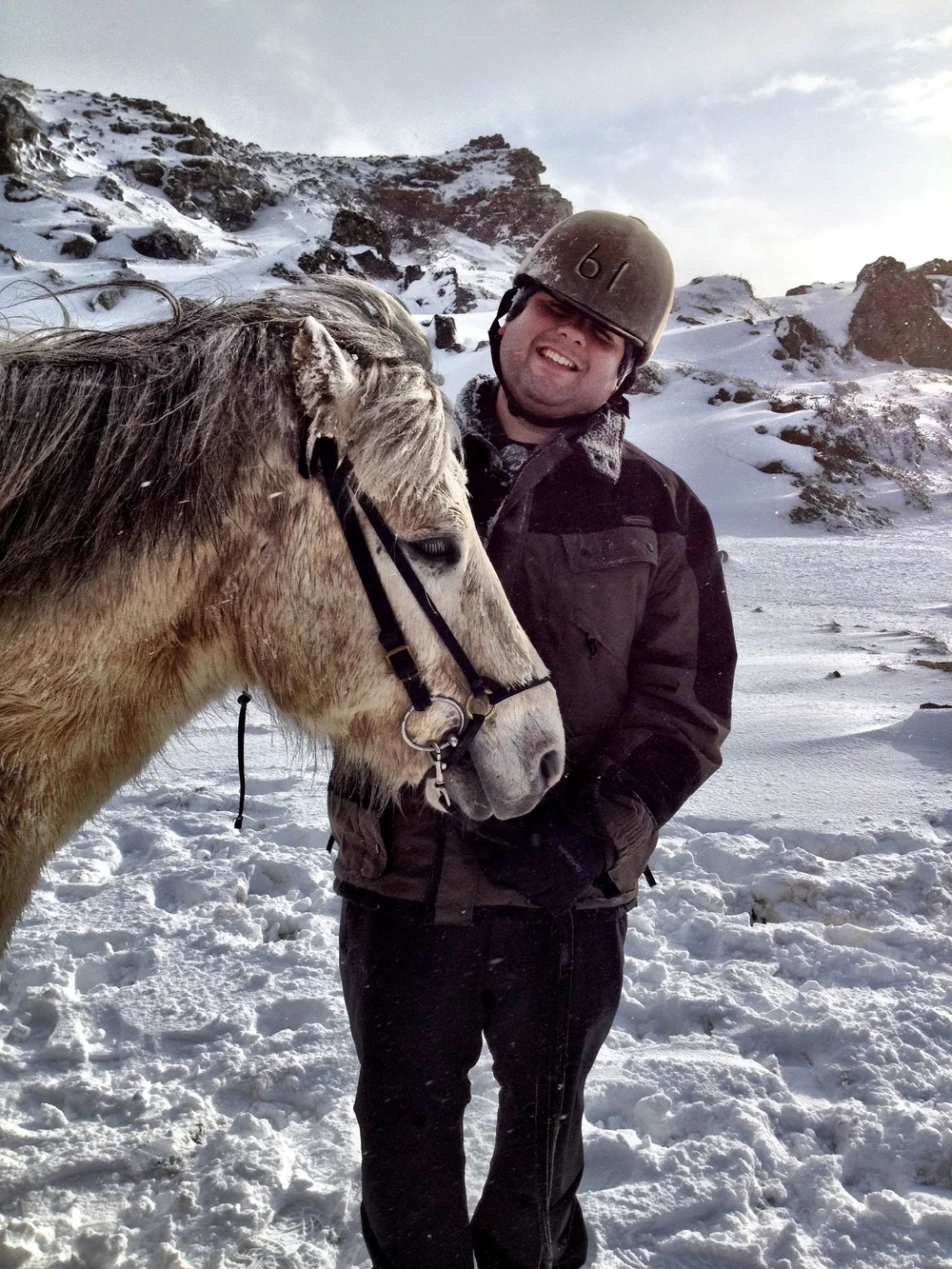 My friend, Eric, with his horse