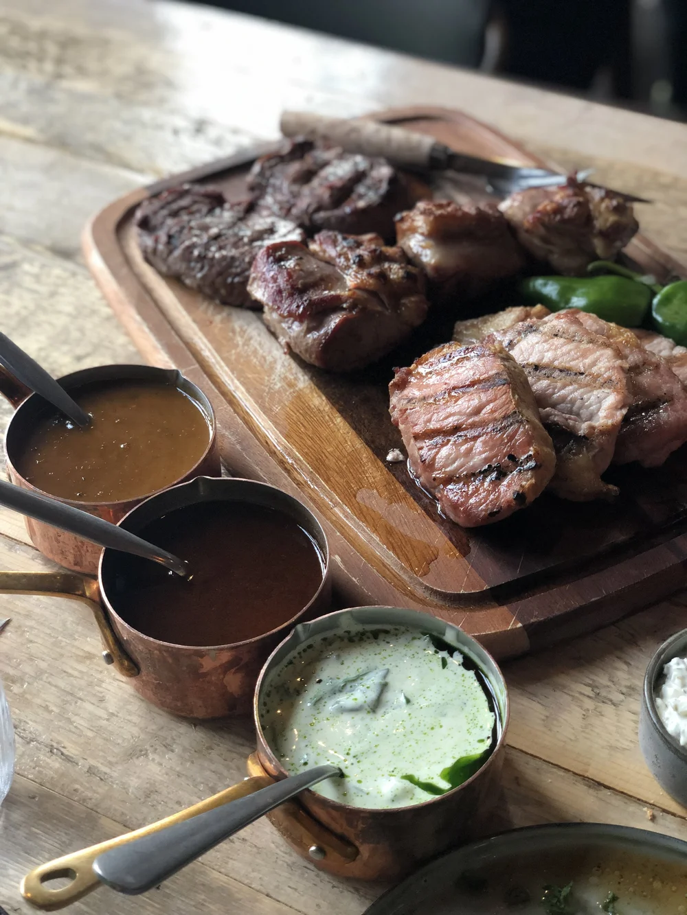 Different meats and sauces at The Tarv