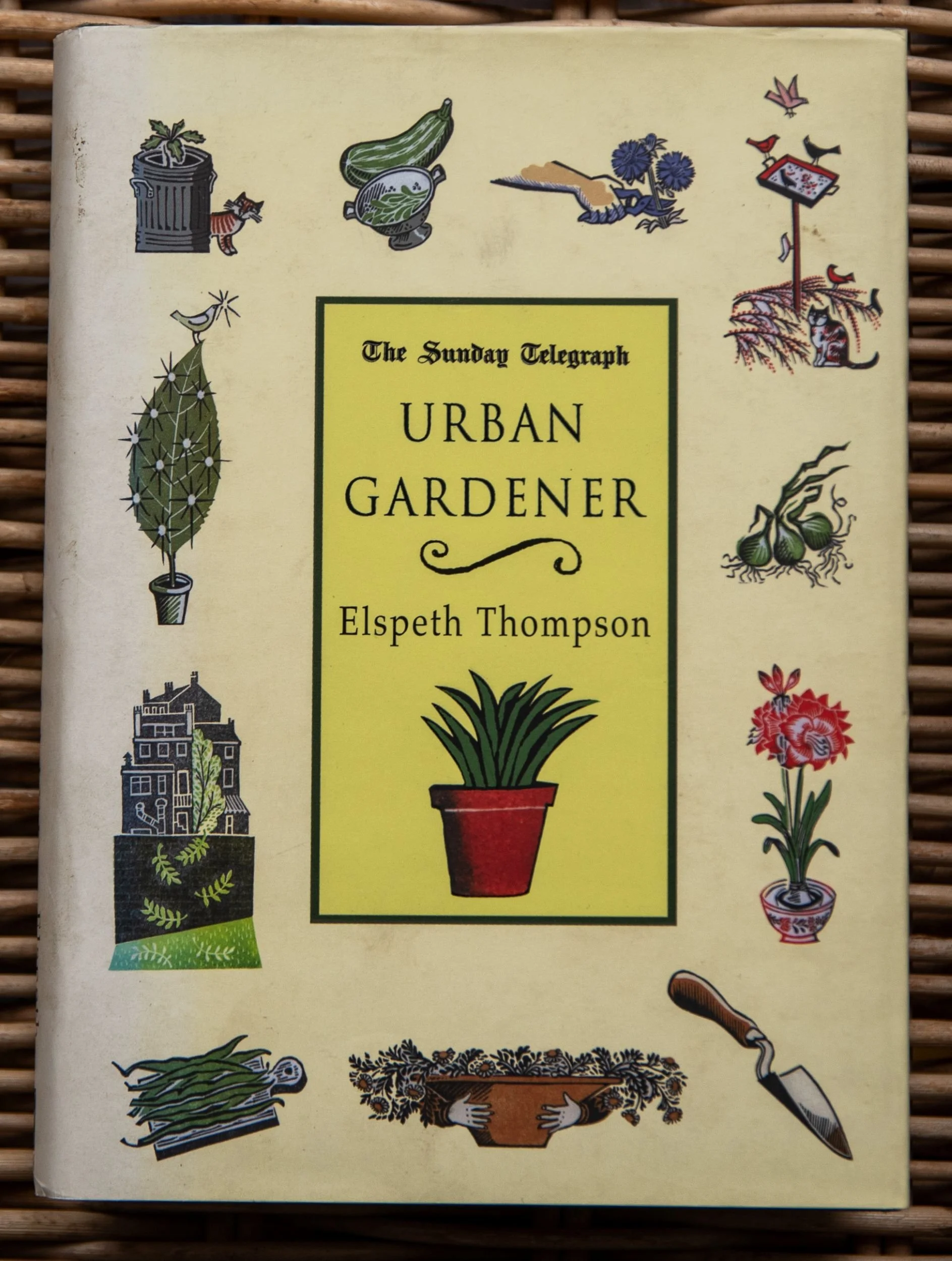 Book cover of Urban Gardener by Elspeth Thompson, decorated with illustrated pots, plants, birds and garden tools around a central yellow panel.