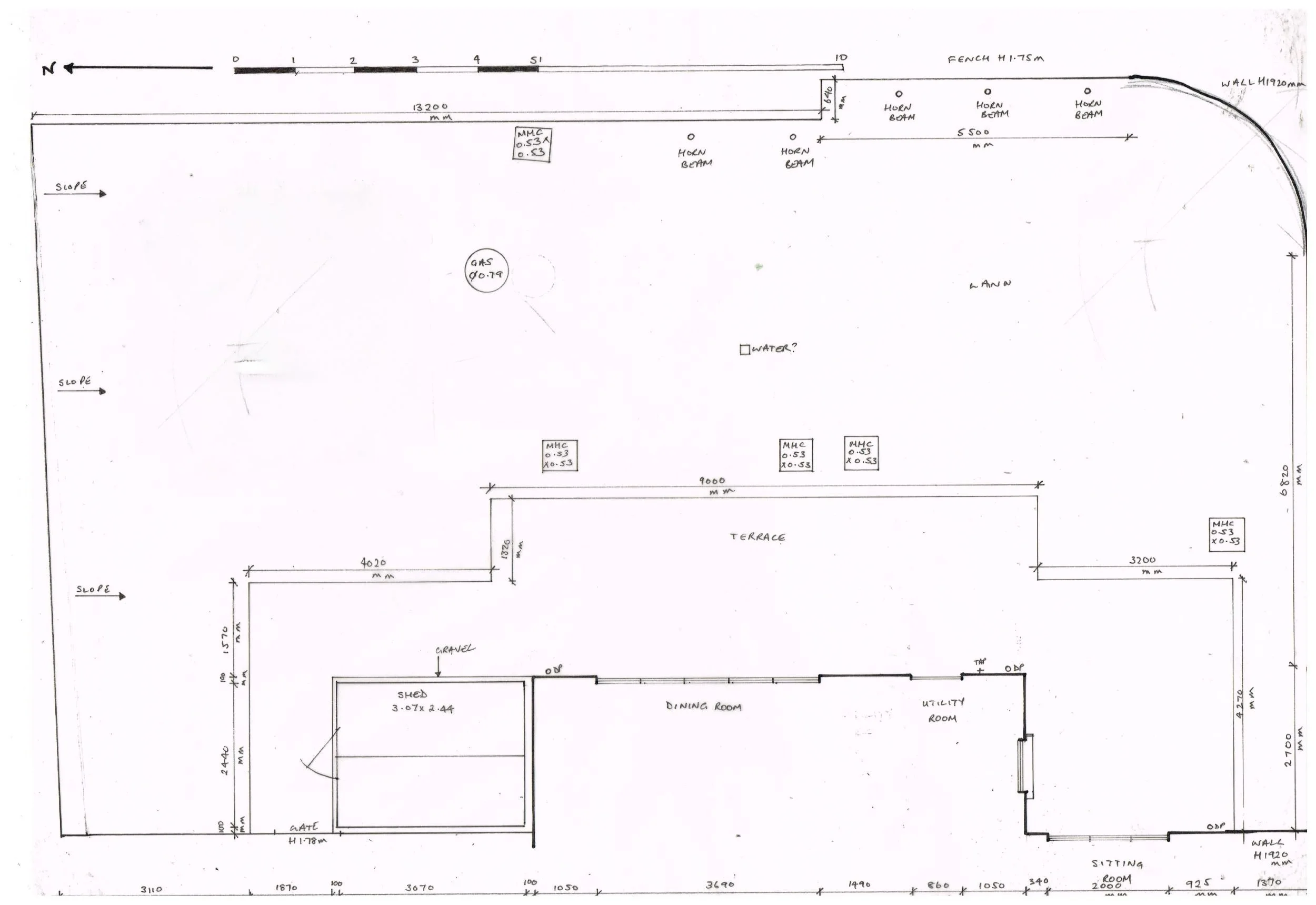 Site survey drawing of the garden with measurements, showing the house, shed, terrace and boundary walls.