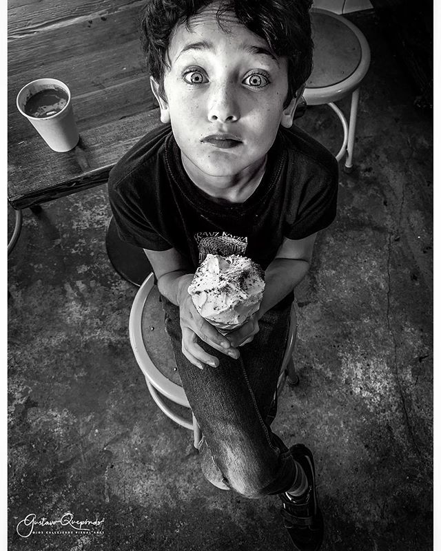 &quot;Ice-cream boy&quot;~ (っ◔◡◔)っ &hearts; 🍦👅~spontaneous portraiture ************************************************************ #kidportraiture #availablelight #iphoneography #iphoneonly #bnw  #shotoniphone #blackandwhitephotography #blackandwh