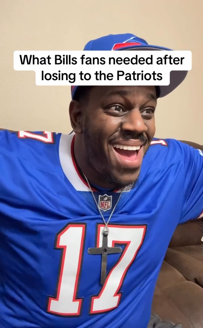 SirrBaby smiling in a Bills jersey beneath the caption What Bills fans needed after losing to the Patriots
