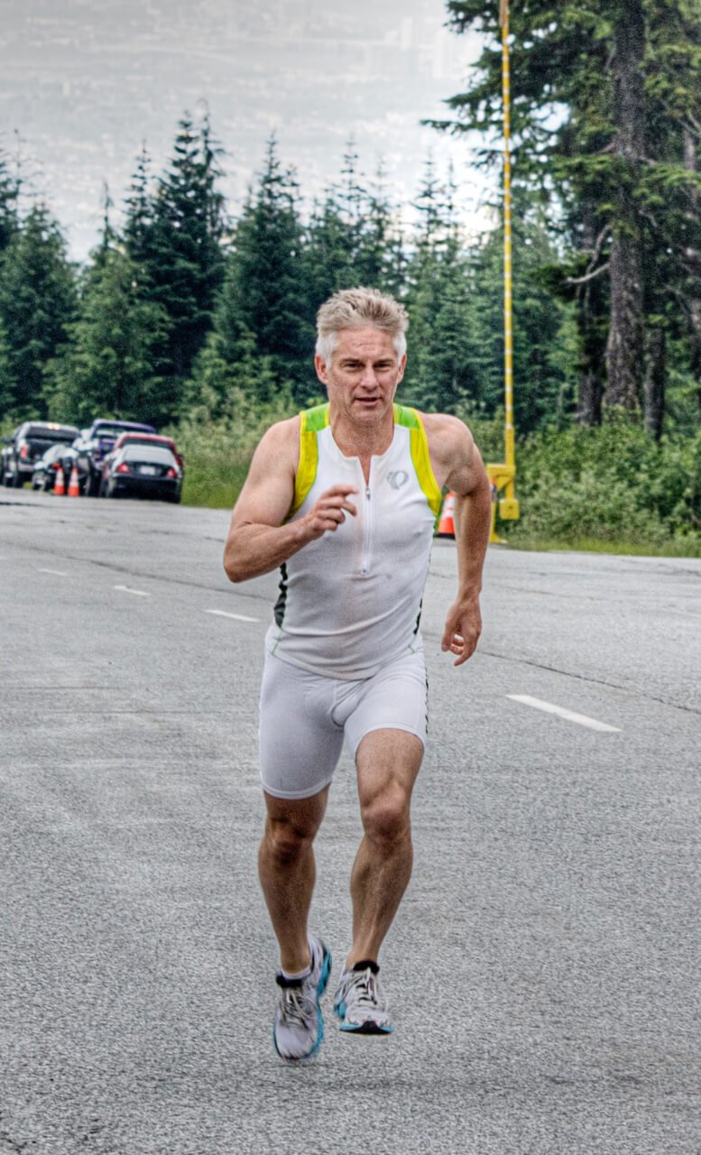FitLifeMove |fitness and wellness for adults 55 and over | Michel Duran running on the road to Mt Seymour.jpg